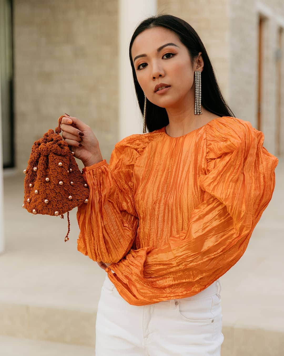 ネッタポルテさんのインスタグラム写真 - (ネッタポルテInstagram)「ORANGE IS THE NEW BLACK: Make a statement with bold tonal dressing like @yoyokulala in @suryo.design's coveted crochet bags. #BagsBulletin  Tap the link in bio to shop your favorite looks from Instagram at #NETAPORTER. 📸: @danrobertsstudio」7月28日 23時04分 - netaporter