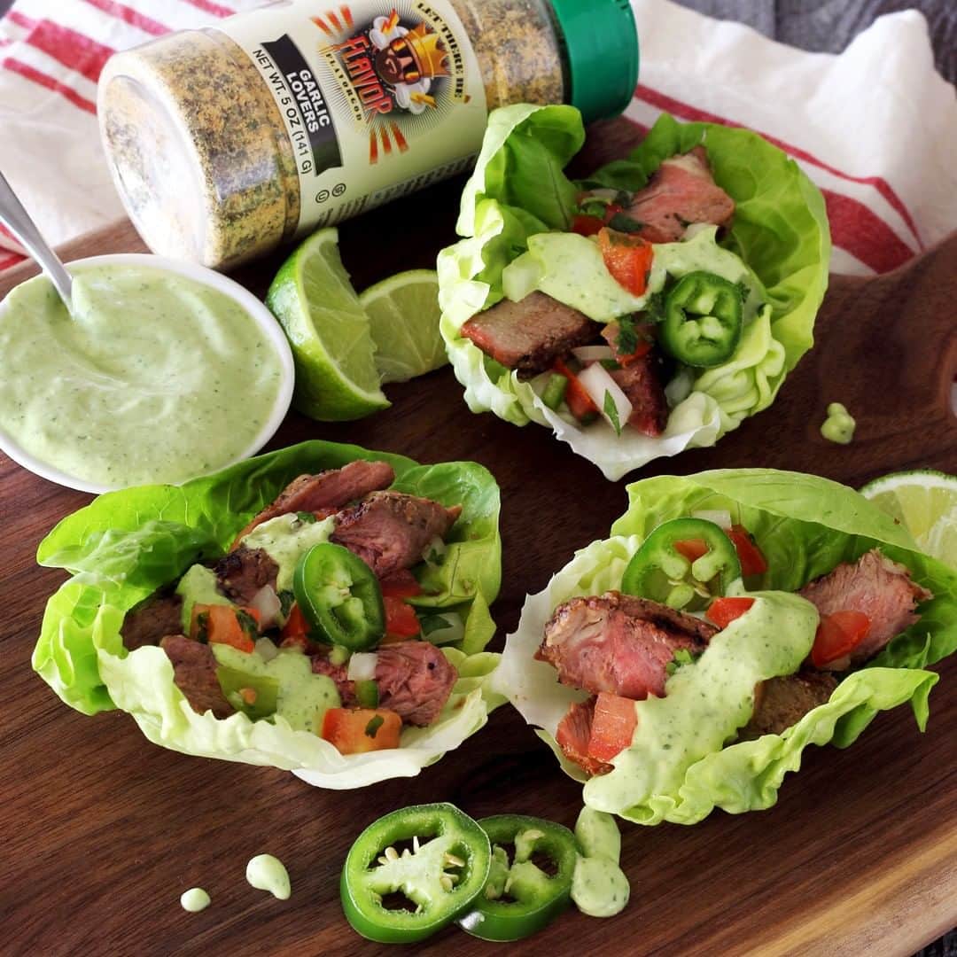 Flavorgod Seasoningsさんのインスタグラム写真 - (Flavorgod SeasoningsInstagram)「STEAK TACOS - KETO approved ✅⁠ -⁠ Here's a great way to serve hot and juicy steak with a little extra flair...as lettuce-wrapped tacos! Features a ribeye steak from @5280meat and @flavorgod GARLIC LOVERS Seasoning.⁠ ⁠ >From @paleo_newbie_recipes:⁠ ⁠ INGREDIENTS⁠ ⁠ 1 lb steak of choice⁠ Flavor God GARLIC LOVERS Seasoning⁠ Salt and Pepper to taste⁠ Butter lettuce⁠ Pico de Gallo⁠ 1 Lime⁠ ⁠ Avocado Sauce⁠ 1/2 avocado⁠ 1/2 cup fresh cilantro⁠ 1/2 jalapeño, seeded⁠ 1/4 cup paleo mayo⁠ 1/4 cup water⁠ 2 Tbsp lime juice⁠ 1 clove garlic⁠ 1/2 tsp salt⁠ ⁠ INSTRUCTIONS⁠ ⁠ Season steak generously with Flavor God GARLIC LOVERS Seasoning, plus a little salt and pepper. Grill or pan fry until your preferred doneness is reached.⁠ --⁠ Add all the avocado sauce ingredients listed above to a blender or food processor. Blend until smooth.⁠ ---⁠ Slice steak into strips and place into butter lettuce cups.⁠ --⁠ Garnish with avocado sauce, Pico de Gallo, fresh jalapeño (optional) and a squeeze of lime.⁠ --⁠ Serves 3-4⁠ -⁠ -⁠ #food #foodie #flavorgod #seasonings #glutenfree #mealprep  #keto #paleo #vegan #kosher #breakfast #lunch #dinner #yummy #delicious #foodporn」7月29日 10時00分 - flavorgod
