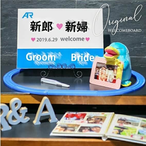 プレ花嫁さんの為の結婚式アイテム通販ファルべさんのインスタグラム写真 - (プレ花嫁さんの為の結婚式アイテム通販ファルべInstagram)「＜#ファルベオリジナル実例 ＞ 鉄道好きさんに人気のファルベ♡ 駅の看板そっくりなウェルカムボード＆ 新幹線チケット風席札をご注文いただきました、 M様より結婚式当日お写真を 送っていただきましたのでご紹介いたします!(^^)! ※お名前部分はぼかしたらわからなくなったので イメージで文字載せています(^^) * * ウェルカムボードは、 看板ぽくするためにフレームには入れず パネルに貼ってお作りいたしました 席札は○○号車の部分はご自身で手書きされています。 手書きで書き込みもいいですね！！ 鉄道好きの新郎新婦様、ぜひ参考にされてくださいね♪ * * 新郎新婦様から嬉しいコメントもいただいています❣️ ＝＝＝＝＝＝＝＝＝＝＝＝＝＝＝ ＜M様より＞  作っていただいた ウェルカムボードも席札もどちらも好評でした！ ゲストの方もたくさん写真を撮って とても楽しんでいただけたみたいです(^ ^) 新郎新婦とも鉄道会社に勤めているので 2人らしさが出る結婚式になったと思います。 本当にありがとうございました！ ＝＝＝＝＝＝＝＝＝＝＝＝＝＝＝ * M様　ご注文ありがとうございました❣️ 末永くお幸せに💖💖💖 * * みなさんもぜひ参考にして、 お二人らしいウェルカムボードや席札作りませんか？ お気軽にお問合せくださいませ！ * * ーーーーーーーーーーーーーーーー﻿ 🌈オリジナルアイテムを作るには？﻿ プロフィール欄から@wedding_farbe ﻿ 「オリジナル作成」のストーリーをチェック☝️﻿ ﻿ 💡参考になるヒント満載！﻿ 卒花さんたちが実際にオーダーした﻿ アイデアいっぱいのオリジナルアイテム﻿ #ファルべオリジナル実例 も必見👀✨﻿ ーーーーーーーーーーーーーーーー﻿ ▼最新情報はプロフィールのリンクからどうぞ ﻿ @wedding_farbe ﻿ ﻿ ▼ペーパーアイテムのアカウントはこちら ﻿ @farbe_paperitem﻿ ーーーーーーーーーーーーーーーー﻿  #ファルベ #farbe #結婚式 #結婚式準備 #結婚式準備プレ花嫁 #プレ花嫁 #プレ花嫁準備 #プレ花嫁応援 #プレ花嫁さん #プレ花嫁サポート #プレ花嫁と繋がりたい #プレ花嫁デビュー　#2019夏婚　#2019秋婚　#2019冬婚　#結婚式アイテム　#wedding #席札　#結婚式席札　#鉄道好き　#新幹線好き　#paperitem」7月29日 21時10分 - wedding_farbe