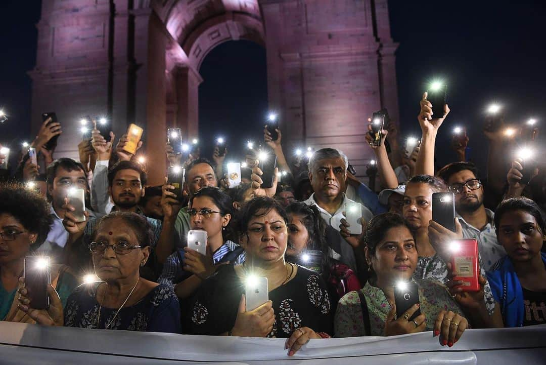 NBC Newsさんのインスタグラム写真 - (NBC NewsInstagram)「Indian social activists raise their phones as they take part in a solidarity rally in front of the India Gate monument for the Unnao rape victim in New Delhi. . An Indian teenager who accused a senior politician of rape is fighting for her life after being critically injured in a crash on July 28 that killed two relatives, raising suspicions of foul play. . 📷 Sajjad Hussain / @afpphoto」7月31日 0時26分 - nbcnews