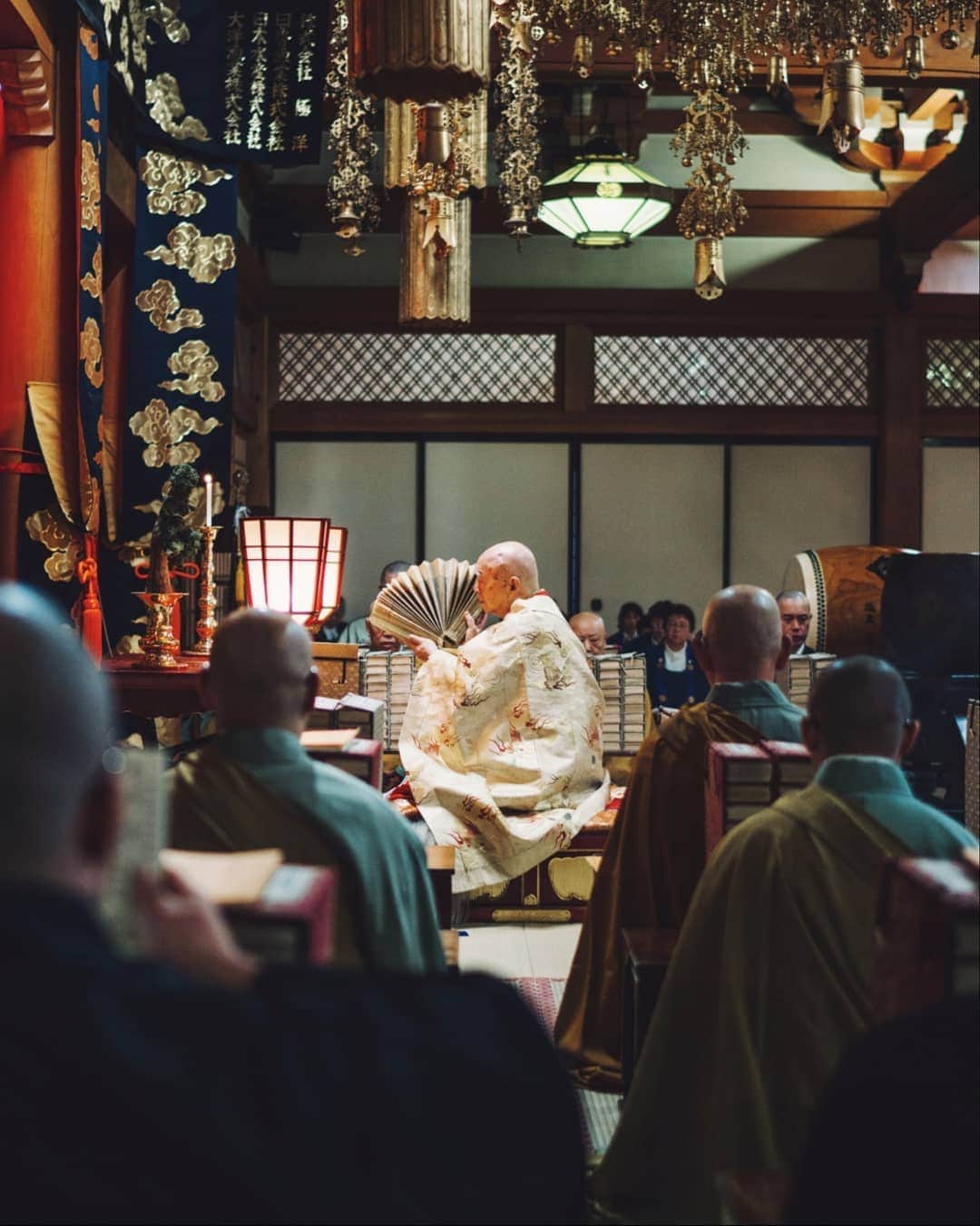 福田洋昭のインスタグラム：「A while back in collaboration with NHK I had the opportunity to capture this prayer at Zenpoji Temple in Yamagata where you can witness Buddhist priests vigorously opening scripts to rid evil of old years.  A practice I could so use right now.  So many hidden gems and so much more to learn about my country 🧾🙏 #NewChapter #HiddenJapan #Yamagata #Zenpoji」