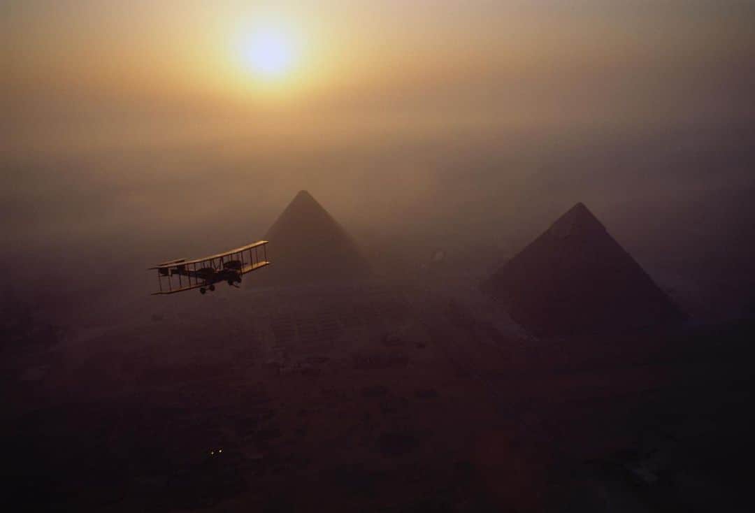 National Geographic Creativeさんのインスタグラム写真 - (National Geographic CreativeInstagram)「Photo by James L. Stanfield | The replica Vickers Vimy aircraft circles the Pyramids of Giza during its journey to re-create the original London to Australia flight of 1919. #Giza #Aircraft #Adventure」7月31日 5時24分 - natgeointhefield