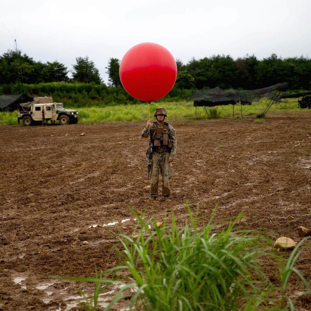 アメリカ海兵隊さんのインスタグラム写真 - (アメリカ海兵隊Instagram)「We All Float in the Field  Lance Cpl. Kody Patrick, a sensor support Marine with 3rd Battalion, 12th Marine Regiment, @3dMarDiv, prepares to release a pibal balloon during the Artillery Relocation Training Program 19.2 in Ojojihara, Japan. (U.S. Marine Corps photo by Lance Cpl. Christine Phelps)  #Marines #Military #Arty #IT」7月31日 21時04分 - marines