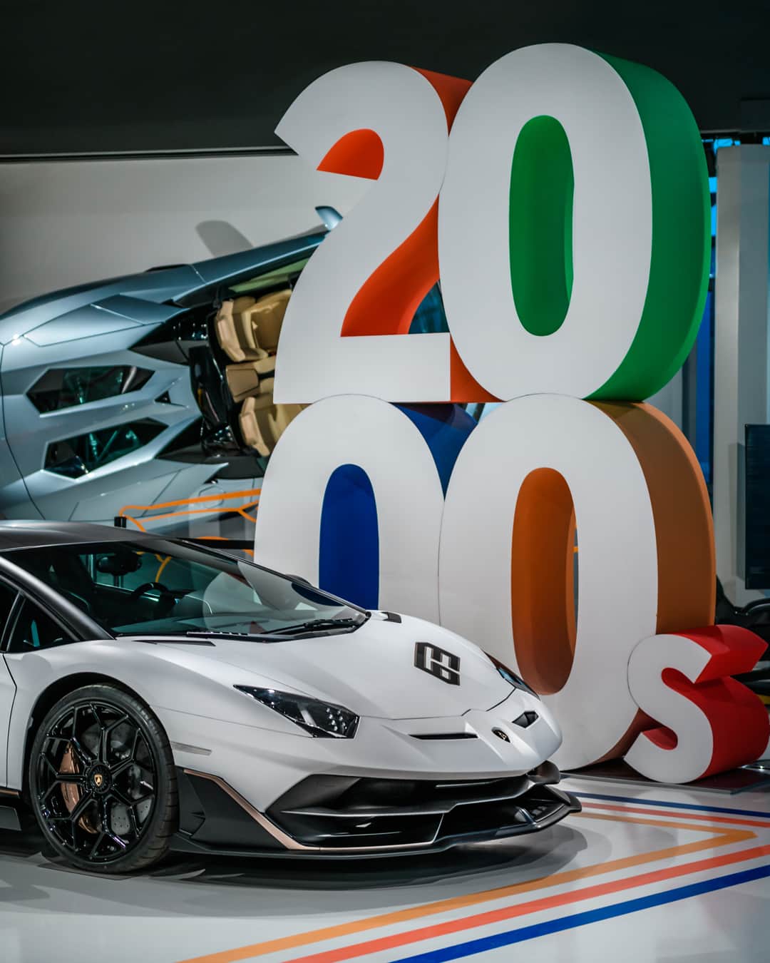ランボルギーニのインスタグラム：「Over fifty years of innovation in a single place for Super Sports Cars’ lovers.  Even in August, you can come and visit our Museum of Technologies MUDETEC to see how technology and style combine to generate unforgettable icons.  #Lamborghini #AventadorSVJ63 #LamborghiniMUDETEC」