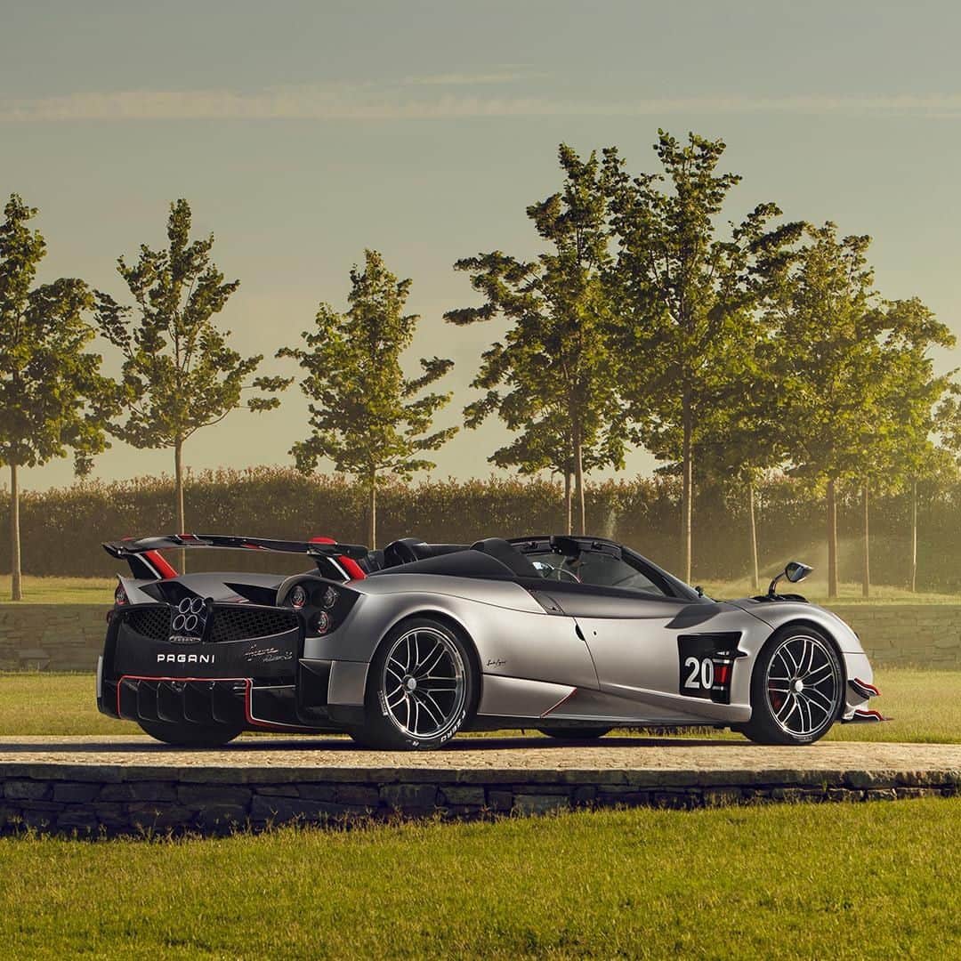 パガーニ・アウトモビリのインスタグラム：「The Roadster BC was designed to generate an aerodynamic load with a downforce target of 500 kg at 280 km/h (1,102 lbs at 174 mph), while maintaining a ground clearance that will allow passengers to enjoy driving at its finest, whether it’s on public roads or racetracks, offering maximum control during a thrilling experience, especially when the new Titanium six-exhaust pipe system starts to exalt the roar of the Pagani twelve-cylinder engine.  #discoveringbc #aerodynamics #exhaust #pagani #huayra #roadsterbc」
