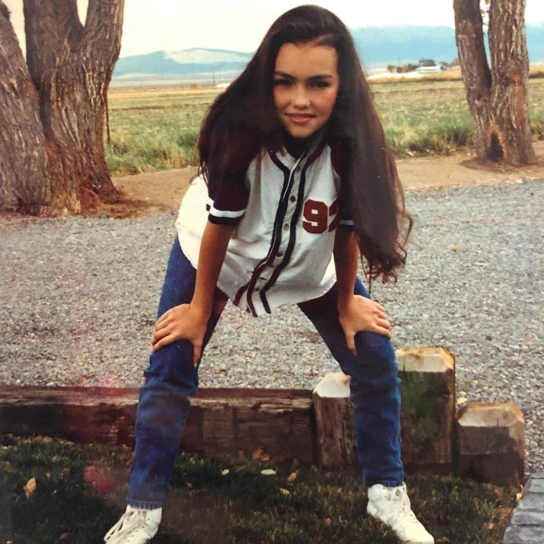 カンディー・ジョンソンさんのインスタグラム写真 - (カンディー・ジョンソンInstagram)「5 FACTS:  1️⃣14 or 15 year old me here, thought this shirt was the coolest.  2️⃣ I wore the heck out of those Pony hi-tops. 3️⃣Back then you only curled the ends of your hair. Only. The. Ends. 4️⃣ And I wasn’t just a baseball poser, I had actually played Softball, my position: shortstop 5️⃣ Things I wish I could’ve reminded her (me)...enjoy all this, don’t let a boy break your heart, always dress how you want, the people that make fun are just miserable and don’t know how to appreciate anything different from themselves. It’s cool that you are a loner and are independent. Yes you were emo before emo was a thing and would sit in your window and look up at the stars and write poetry and paint and draw and listen to mixtapes and cut things out of magazines to make collages and dress up in crazy outfits. And thankfully you don’t even know what  social media is, because it doesn’t exist yet!😂 #TBT #throwbackthursday #baby #kandee」8月2日 13時43分 - kandeejohnson