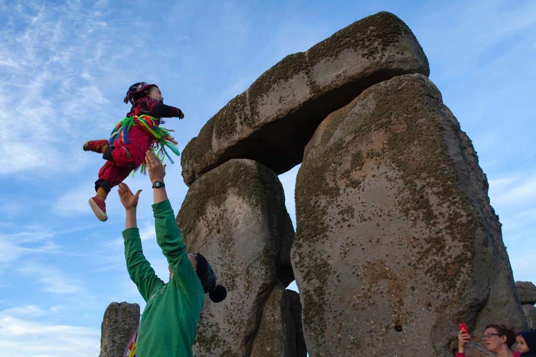 thephotosocietyさんのインスタグラム写真 - (thephotosocietyInstagram)「Photography by @remibenali. Neolithic site of Stonehenge, England. "Lighter than air, anchored in Mankind as a rock". In the August issue of the National Geographic magazine, I am pleased to present a 2 years long assignment regarding the origins of the First Europeans. This image of a family celebrating the Summer Solstice in Stonehenge is not printed in the magazine, don't you desserve a little "exclusive" here on TPS ? ;) But there are plenty of others photos published, meticulously chosen by Senior Editor Kurt Mutchler and Director of Photography Sarah Leen that I thank both warmly for their confidence, as well as Andrew Curry for his excellent writing and great company on the field. It was a long and challenging work, with new scientific knowledge unfolding while progressing on the path. Since prehistoric time, Europe has always been a land of mixing, a melting-pot of bloodlines from Africa, the Middle-East and today's Ukraine and Russia. We are all connected. #onemankind. Best Regards from France. Remi.  #nationalgeographic, #nationalgeographicsociety, #nationalgeographicmagazine, #europe, #stonehenge」8月3日 4時40分 - thephotosociety