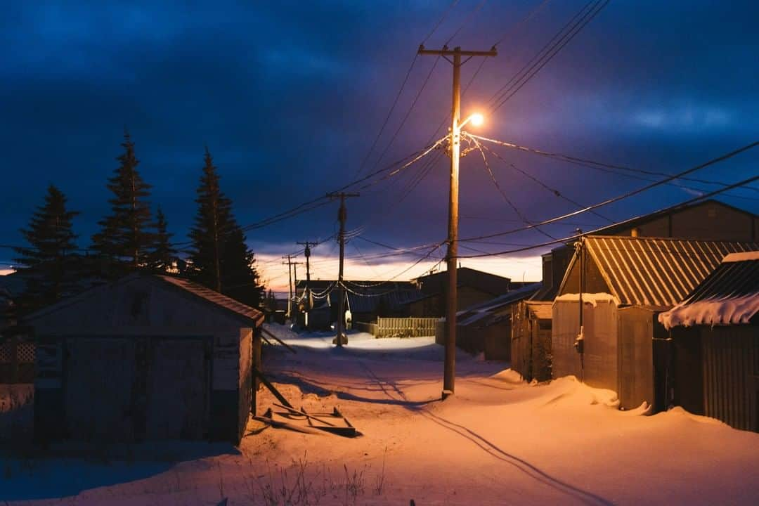 National Geographic Travelさんのインスタグラム写真 - (National Geographic TravelInstagram)「Photo by @max.lowe I Never have I looked down an empty  back alley at dusk quite the same as I did during my time in polar bear country while working on a story surrounding the great white denizens of the north in Churchill Manitoba. Rarely in this world do we experience what it is to feel like you exist below the top of the food chain, and perhaps we would revere the natural world and the power therein a bit more if that feeling was more present across the front of humanities interaction with the natural world. To see more from my time in the Canadian Arctic follow @max.lowe」8月3日 13時07分 - natgeotravel