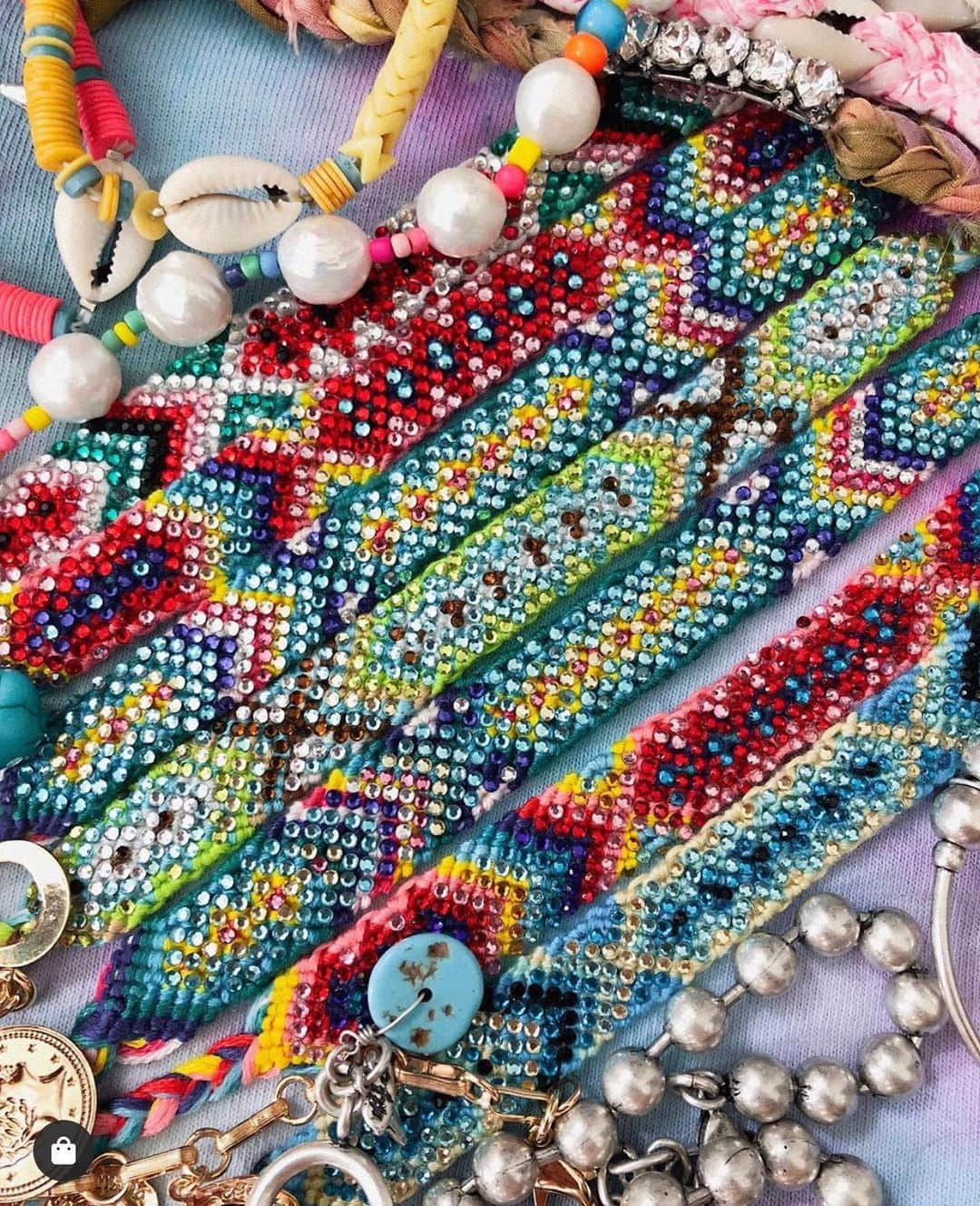ダニジョーのインスタグラム：「YOUR WEEKEND BLING 🌈✨ tap to shop our best-selling @dolorispetunia x DANNIJO friendship bracelets」