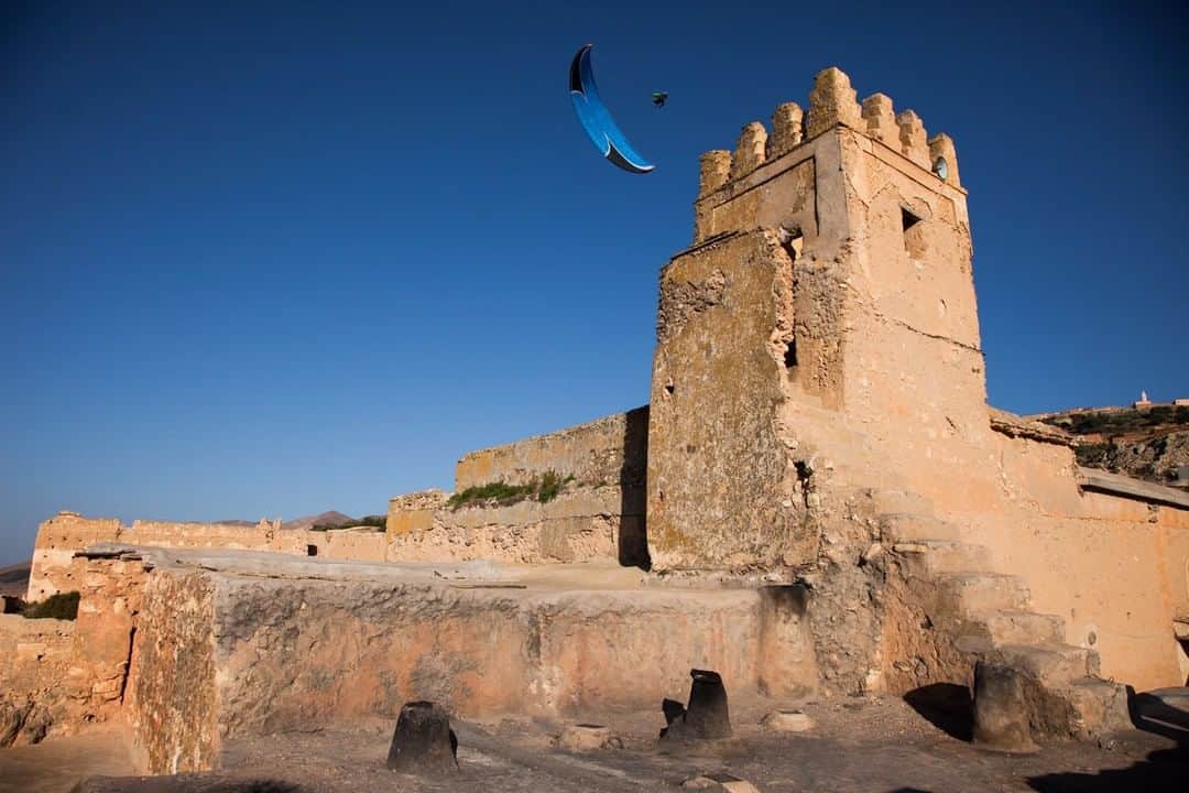 National Geographic Travelさんのインスタグラム写真 - (National Geographic TravelInstagram)「Photo by @jodymacdonaldphoto | Between its Atlantic and Mediterranean coastlines, rugged mountain interior, and rich culture, Morocco is a place of stark beauty. It was during a paragliding expedition many years ago that I first caught a glimpse of this ancient ruin. The color of the building’s stonework, coupled with the bright blue skies above, took my breath away. I asked pilot Gavin McClurg to fly near it so I could try to capture this beautiful ancient world but add some modernity to it. We were only able to try it once, but I liked the way it turned out. Follow me @jodymacdonaldphoto to see more images of my adventures and travels from around the world. #morocco #travel #beautiful」8月4日 19時03分 - natgeotravel