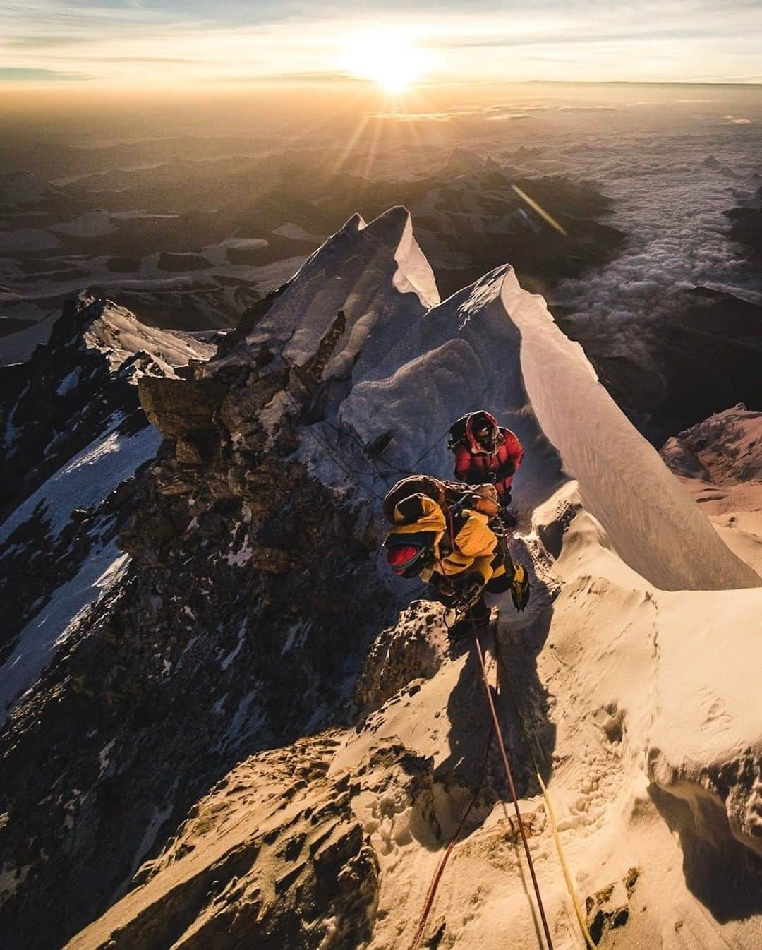 National Geographic Travelさんのインスタグラム写真 - (National Geographic TravelInstagram)「Photo by @Renan_Ozturk | Kagi and Lakpa Sherpa getting hit by the first rays light close the summit of Everest. The role of ‘climbing sherpas’ has changed and evolved overtime and I believe these days the Nepalis working in this field have more and more control over the outcome of every expedition. We learned this the hard way on our recent #everestmystery assignment and @natgeochannel film. Stay tuned for more story details and follow me @renan_ozturk for more images from the roof of the world.」8月4日 22時03分 - natgeotravel