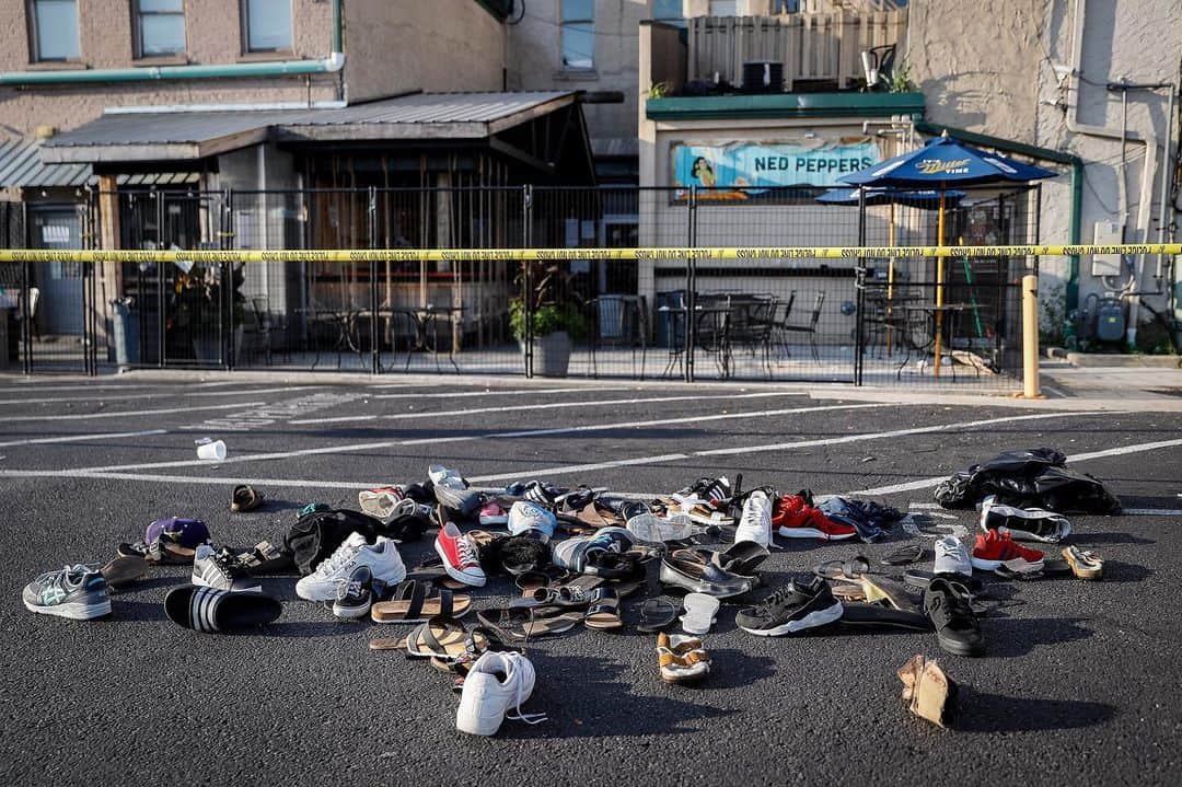 TIME Magazineさんのインスタグラム写真 - (TIME MagazineInstagram)「Shoes are piled outside the scene of a mass shooting that occurred on Sunday in Dayton, Ohio. The loss of at least 29 lives in El Paso and Dayton in less than 24 hours is just the latest additions to an ever-increasing national death toll. Since the Columbine shooting in 1999, there have been many U.S. massacres that have claimed dozens of victims. Mass shootings have become such a common occurrence, they have transformed American life — turning places that were once thought safe into areas where people now arrive worried about worst-case scenarios. Read more at the link in bio about the images that capture the fear, hurt and chaos from a dozen major mass shootings in the U.S. in the 20 years since Columbine. Photograph by John Minchillo—@apnews」8月5日 20時57分 - time