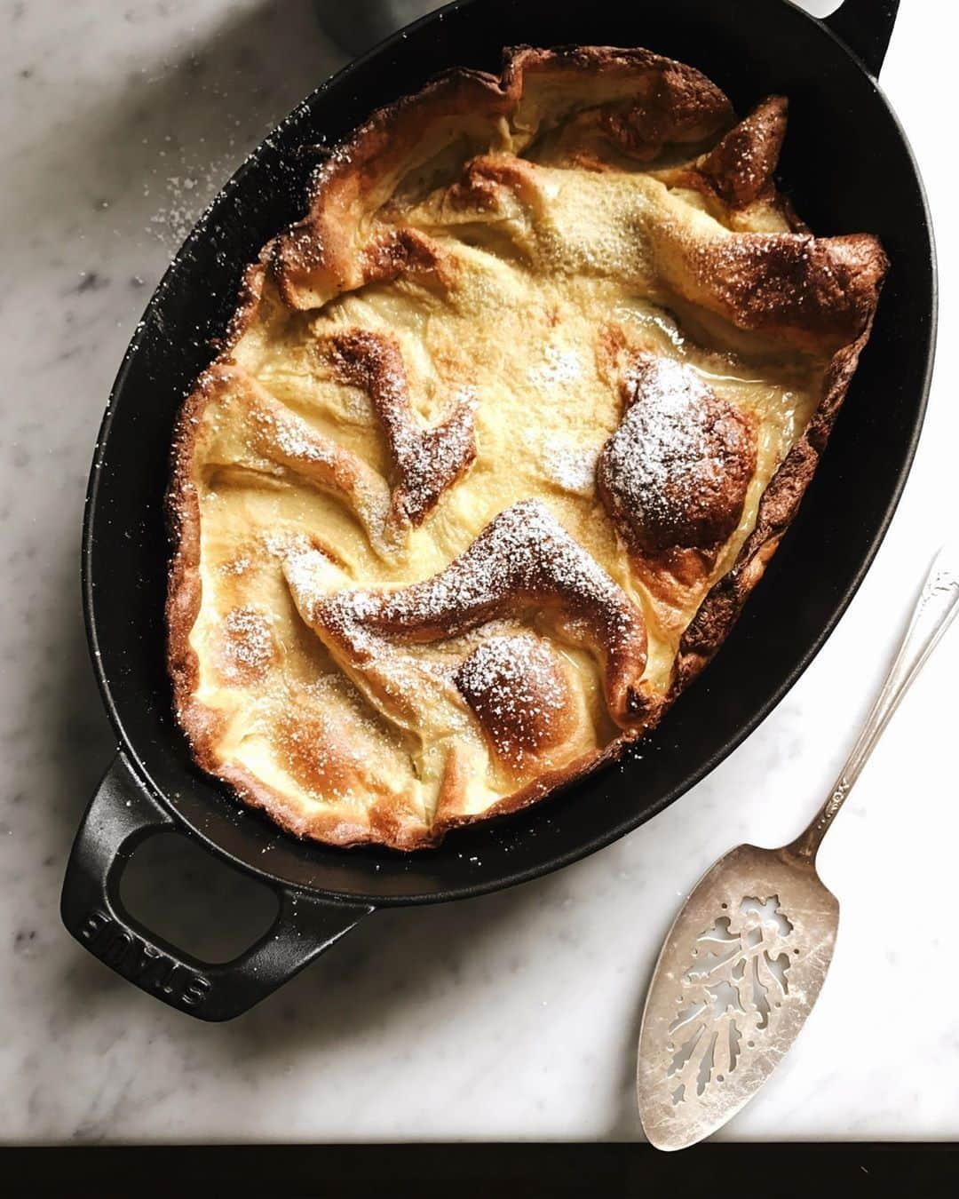 Staub USA（ストウブ）さんのインスタグラム写真 - (Staub USA（ストウブ）Instagram)「With crispy edges (thanks to our hot cast iron!), an airy texture and custardy folds that catch sauces and butter: a dutch baby is our favorite blank canvas for any meal. Top it with eggs and avocado? You have brunch. Top it with ice cream and sliced fruit? You have dessert. Top it with greens? You have an elevated salad. (We stole this tip from @saltncopper!) Or, do as @fortheloveofthesouth and top your #dutchbaby with a dusting of powdered sugar and a squeeze of lemon juice. Perfection. . 📸 @fortheloveofthesouth #madeinStaub Cast Iron Gratin Baking Dish. #Staub」8月5日 22時00分 - staub_usa