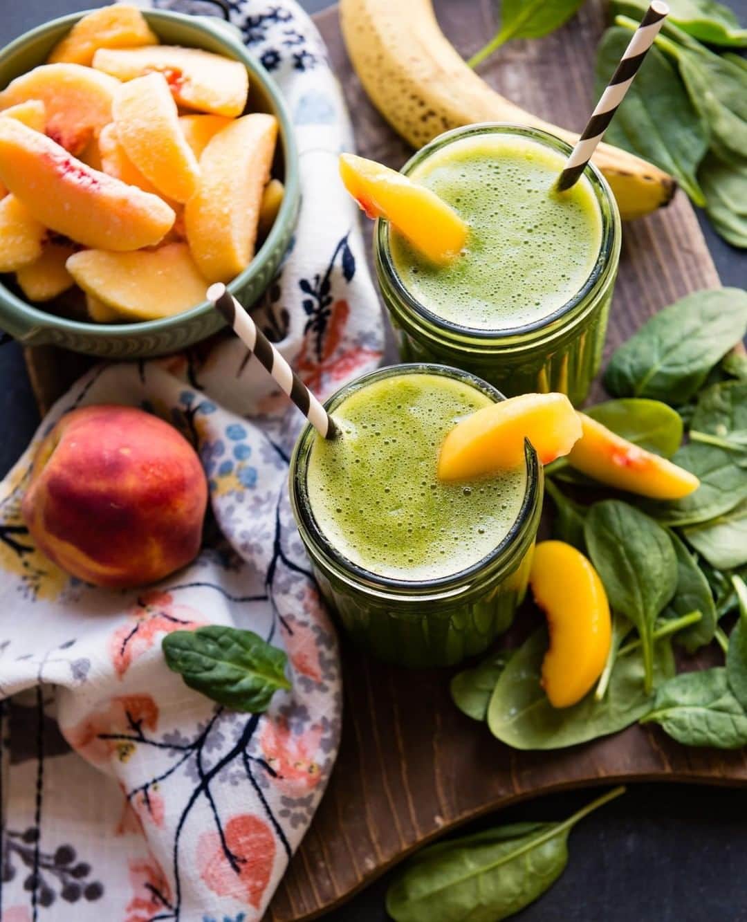 Simple Green Smoothiesさんのインスタグラム写真 - (Simple Green SmoothiesInstagram)「It's the HEIGHT of PEACH SEASON! 🍑 Making it the perfect time to blend the tastiest peach smoothie you'll ever taste.⁠ ⁠ There’s nothing quite like finding a perfectly ripe peach and taking it over to the kitchen sink to devour it, juice dripping down your chin, savoring every sweet bite. This is also why I love blending with peaches.⁠ ⁠ BONUS: This smoothie is low in sugar and high in fiber which is great if you’re looking for a lower glycemic option. Feel free to swap the banana with ½ avocado if you want to cut the fruit sugars even more.⁠ ⁠ PEACH BANANA SMOOTHIE I serves 2⁠ Ingredients⁠ ⁠ 1 cup fresh spinach⁠ 1 cup water⁠ 1 cup peaches⁠ 1/2 banana⁠ ⁠ Instructions⁠ 1. Place spinach and water in blender Puree until smooth.⁠ 2. Add remaining fruit and blend again.⁠ ⁠ #smoothie #blendyourgreens #greensmoothie #peaches #banana #lowsugar #inseasonfruit #farmersmarketfinds #blendit #blender」8月6日 0時00分 - simplegreensmoothies