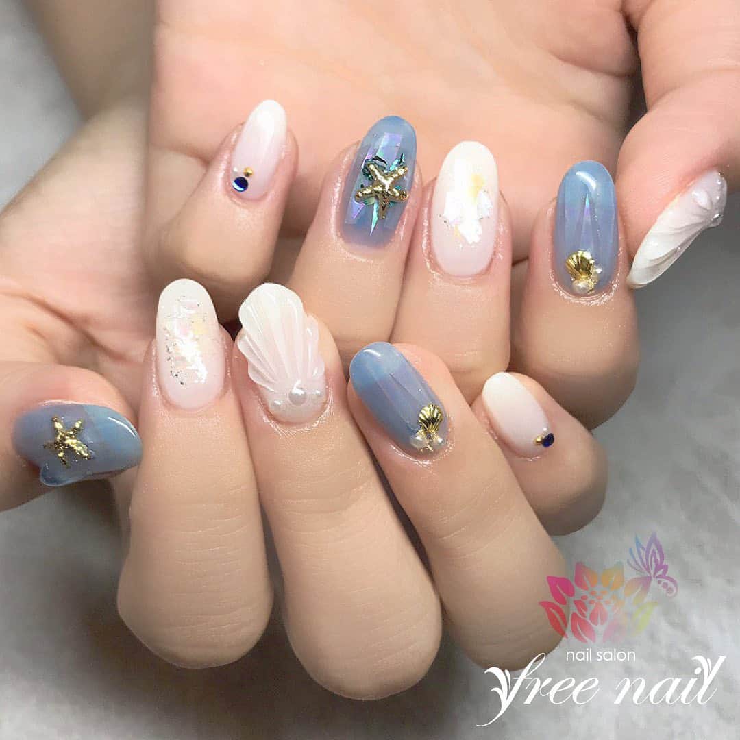 free nail フリーネイルのインスタグラム：「. お客様ネイル💅🏻🌊✨ . マーメイドネイル🧜🏻‍♀️💕 . Best Summer Nailsは 人魚の鱗ネイル🧜🏻‍♀️🐚⭐️ . ご来店ありがとうございました🙇🏻‍♀️🙇🏻‍♀️🙇🏻‍♀️💗 . #ネイル #フリーネイル #ネイルアート #ジェルネイル #ネイルサロン #大阪ネイルサロン #ネイルデザイン #ネイルチェンジ #サマーネイル #マーメイドネイル #人魚の鱗 #人魚の鱗ネイル #シェルネイル #ホログラムネイル #ホワイトネイル #ブルーネイル #デザインネイル #トレンドネイル #おしゃれネイル #人気ネイル #夏ネイル #美甲 #日式美甲 #summernails #nailsart #nailsalon #nailsdid #newnails #newnail #freenail」