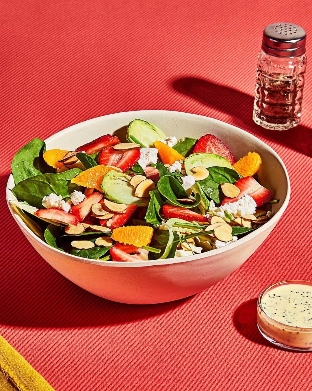 Chobaniのインスタグラム：「The Strawberry and Feta Salad with Lemon Poppy Seed Vinaigrette is summer in a bowl. Shredded Brussels sprouts and fresh seasonal fruit on a bed of spinach, topped with feta cheese and toasted almonds, tossed in a bright, lemony poppy seed dressing. Consider your lunch plans for the rest of the summer covered. Available now for a limited time only at the Chobani Café in Soho. Tag your lunch buddy.」
