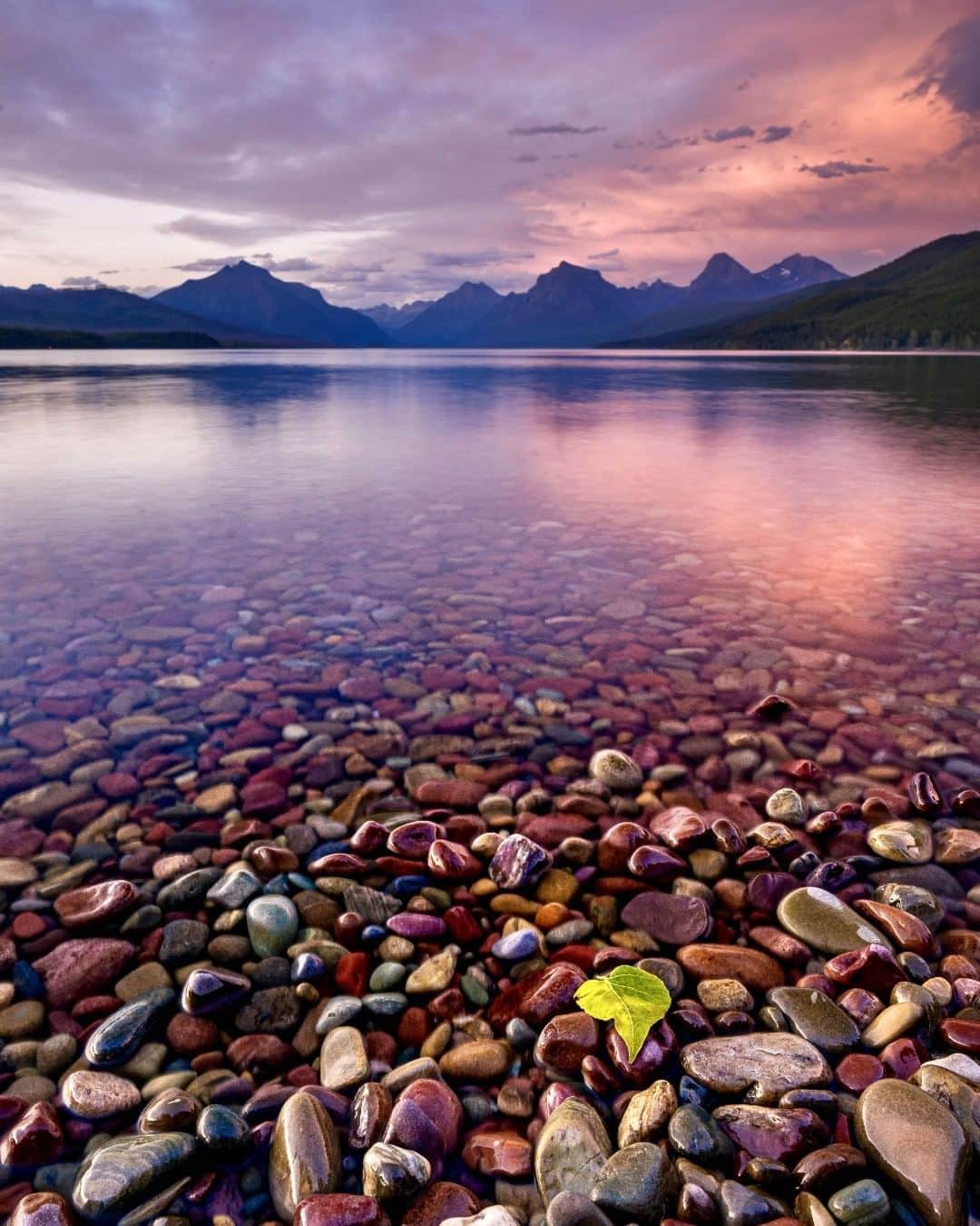 アメリカ内務省さんのインスタグラム写真 - (アメリカ内務省Instagram)「With towering mountains, dramatic glacier-carved valleys and sparkling alpine lakes, #Glacier #NationalPark in #Montana is one of the most beautiful places in America. Driving on park roads or hiking on remote trails, gorgeous views appear around every turn. Lake McDonald is a popular place to stop and cool your heels while you marvel at the vibrant colors of the rocks and the clouds at sunset. Photo @GlacierNPS courtesy of Mallory Wilson (@hello_mallory). #travel #FindYourPark #usinterior」9月1日 0時15分 - usinterior