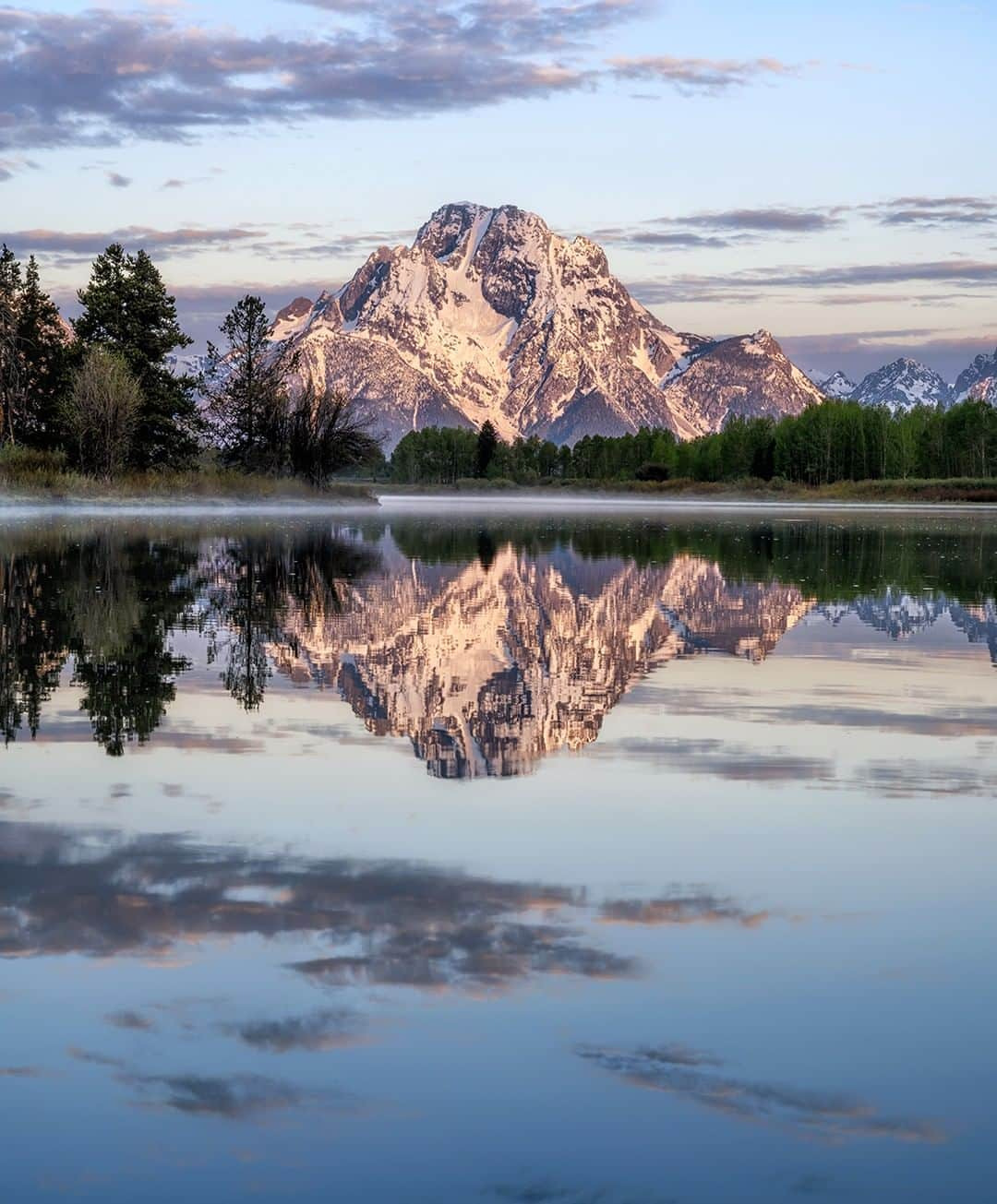 Nikon Australiaさんのインスタグラム写真 - (Nikon AustraliaInstagram)「"I have photographed this beautiful and popular location in Grand Teton National Park countless times. This morning, I wanted something new. Even though the scene just screams to be photographed horizontally, I chose a vertical composition to include the vast stillness of the water." - @mandyleaphoto  Camera: Nikon #Z7 Lens: NIKKOR Z 24-70 f/4 S Settings: ISO 100 | 70mm | f/22 | 1/5s  #MyNikonLife #Nikon #NikonAustralia #NikonTop #Photography #DSLR #LandscapePhotography #NaturePhotography #NikonZ7 #ZSeries #MirrorlessCamera」9月1日 13時30分 - nikonaustralia