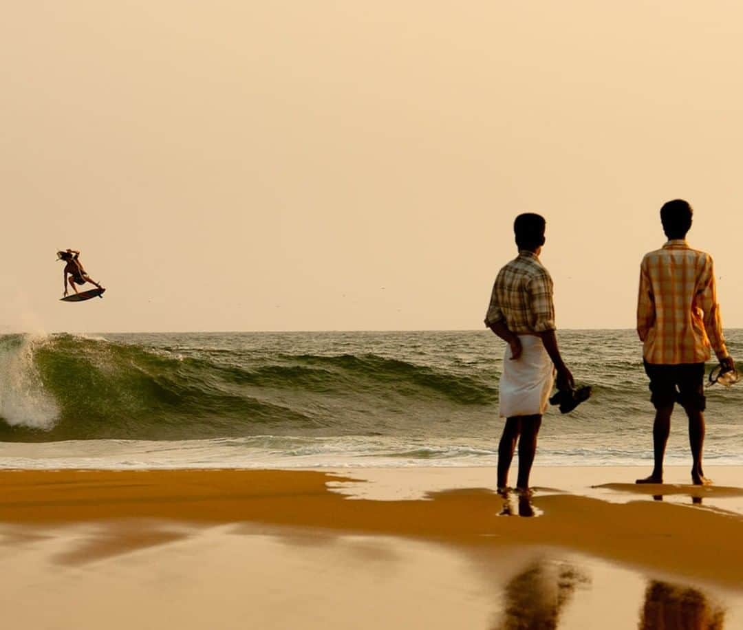 National Geographic Travelさんのインスタグラム写真 - (National Geographic TravelInstagram)「Photo by @Chrisburkard | I’ve learned a lot of different things from my travels but one of the first things I quickly realized is that people around the world are always intrigued by the idea of using a small plank to ride the ocean’s waves. Regardless of where they’re from, what language they speak, what religion they follow, if they’ve never seen people surf, or if they’ve seen it a million times, people are always mesmerized by surfing and stop what they’re doing to watch it. Craig Anderson putting on a show from some locals in India.」9月2日 5時03分 - natgeotravel