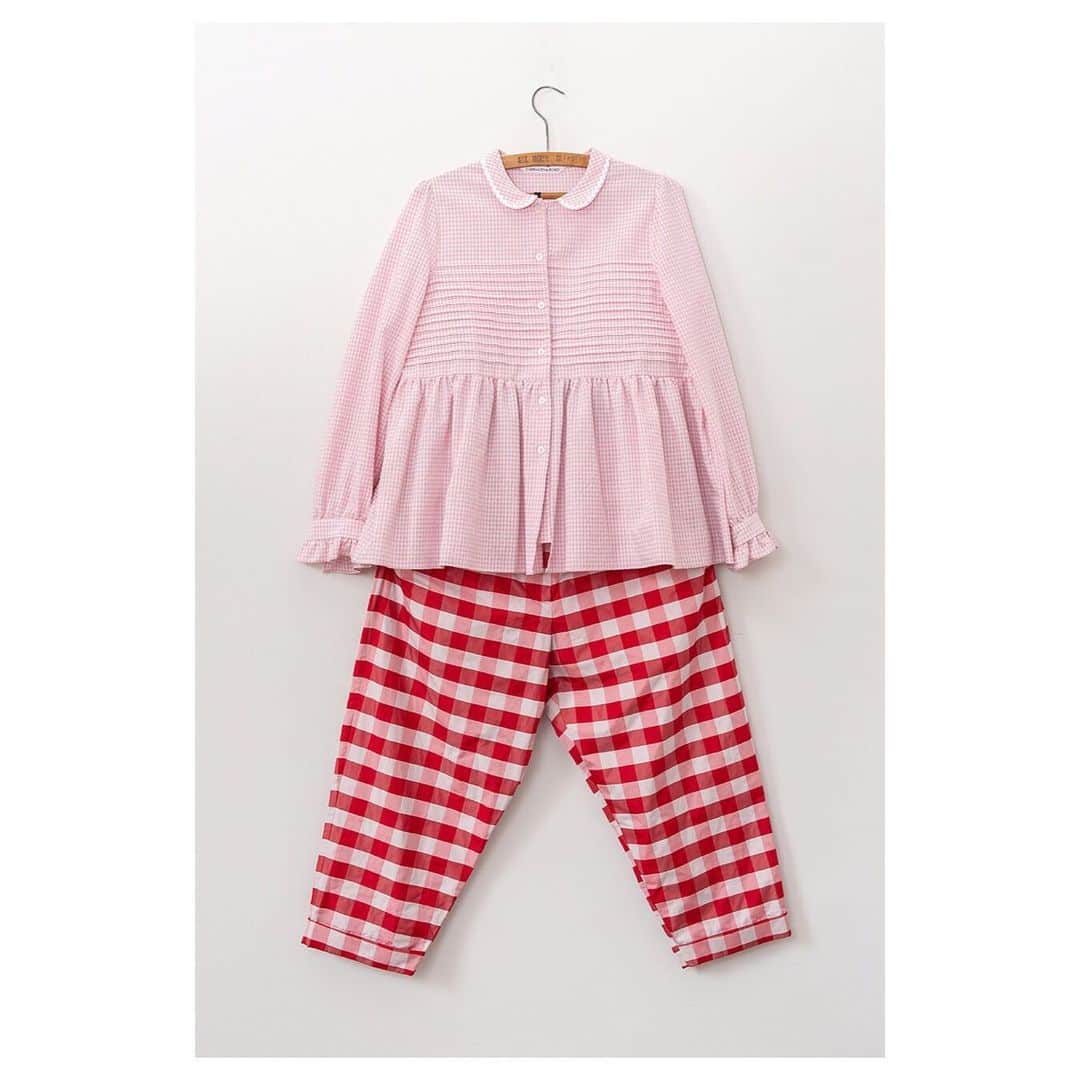 キャベジズ&ローゼズのインスタグラム：「As Perdie as a picture ❤ The Perdie  Blouse in spirited pink seersucker and our lithe Cosima Trousers in Italian checks are a perfect pair. Cosima is 20% off whilst stocks last. 👇Tap to shop Cosima now👇#taptoshop #redandwhitecheckered #redtrousers #italianfabrics #madeinlondon #comfortabletrousers #summeroutfit #pinkandred #cabbagesandroses #cabbagesandrosesfashion @christina_strutt @cabbagesandroses_shop 👆Link In Bio👆」