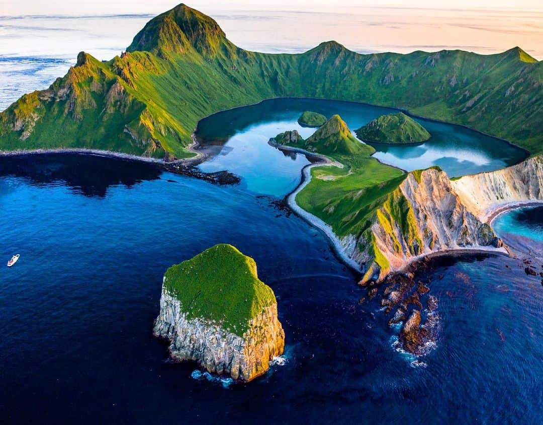 クリス・バーカードのインスタグラム：「These once and still disputed islands remain about as untouched as when the ancient Ainu people lived there. Little to no signs of human’s exist besides the deep holes they dug for lookouts and homesteads.  There is much to be explored about the opportunities for tourism vs commercial fishing or extractive resources for this area in the future. All I know for now is that getting granted the government permit to come ashore here was no easy process & basically an answer to prayers. Im hoping our film project can shed more light on this incredible place.  #fromkurilswithlove」