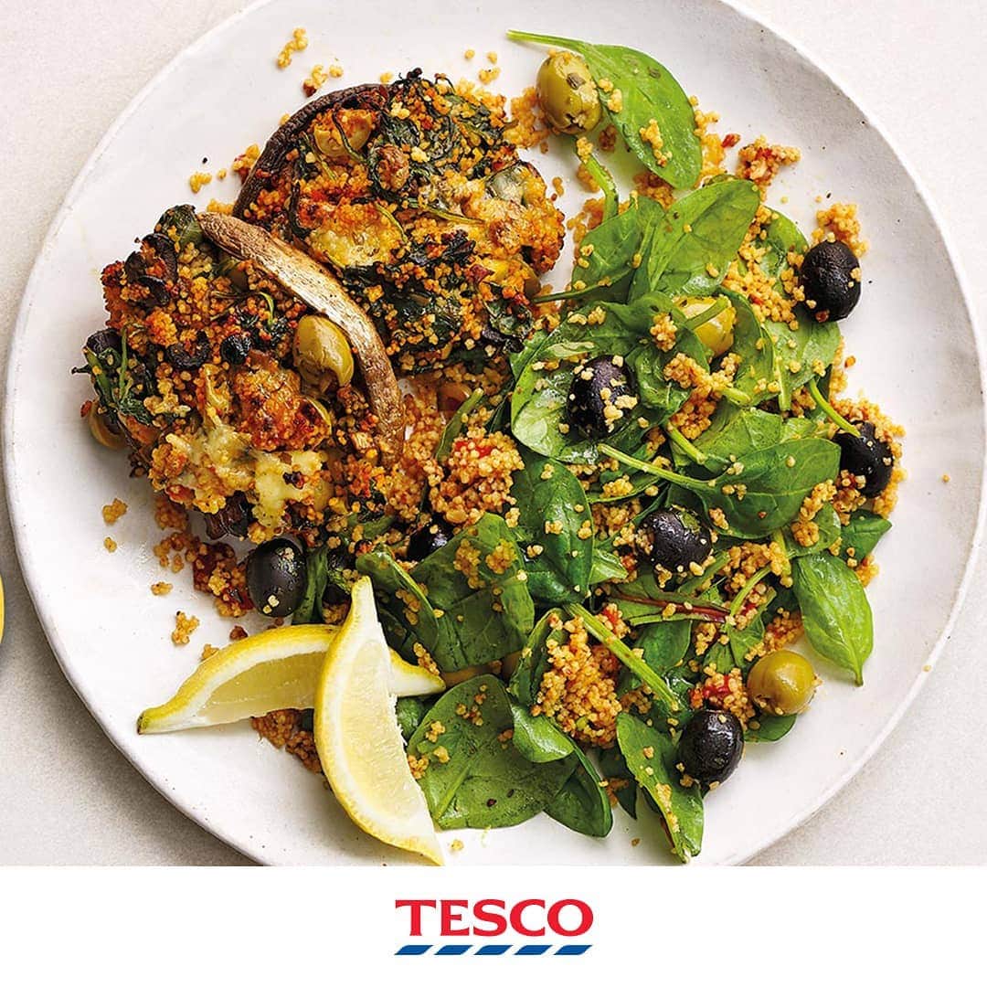 Tesco Food Officialさんのインスタグラム写真 - (Tesco Food OfficialInstagram)「Presto changeo!  Add a little #MeatFree magic to your Monday night - turn 5 familiar ingredients into these spinach and cheddar stuffed mushrooms. A perfectly zesty and aromatic tea for two.  Ingredients 110g pack Mediterranean Inspired Couscous 250g pack Large Flat Mushrooms 220g pack Mixed Olives with Mature Cheddar 80g Baby Spinach 1 Lemon  Method Preheat the oven to gas 7, 220°C, fan 200°C. Prepare a 110g pack Mediterranean Inspired Couscous to pack instructions. Finely chop the stalks from a 250g pack Large Flat Mushrooms. Brush the caps with olive oil and put top-side down on a baking tray. Chop the Cheddar and about half the olives from a 220g pack Mixed Olives with Mature Cheddar. Heat 1 tsp oil in a pan and cook the mushroom stalks with 80g Baby Spinach for 2-3 mins until wilted. Remove from the heat; stir through the chopped olives and Cheddar, 100g couscous and the zest from 1 Lemon; pile into the mushroom caps. Bake for 10 mins. Mix another 80g spinach with the couscous and half the remaining olives. Whisk 2 tsp lemon juice with 1 tbsp olive oil; season with pepper and toss through the salad. Serve with the mushrooms and extra lemon wedges.」9月2日 21時04分 - tescofood