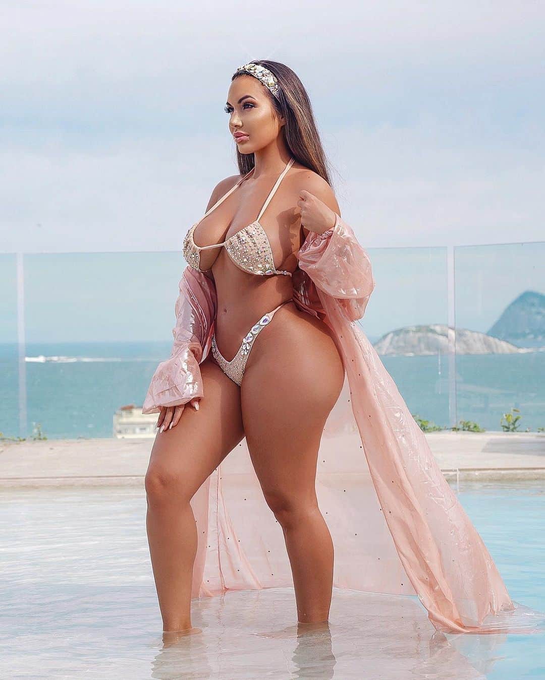 Aylen Aのインスタグラム：「Sometimes, all you need is a change in scenery ✨ Love my crystal custom made swimwear & coverup from @ottilia.and.sugar 👑」