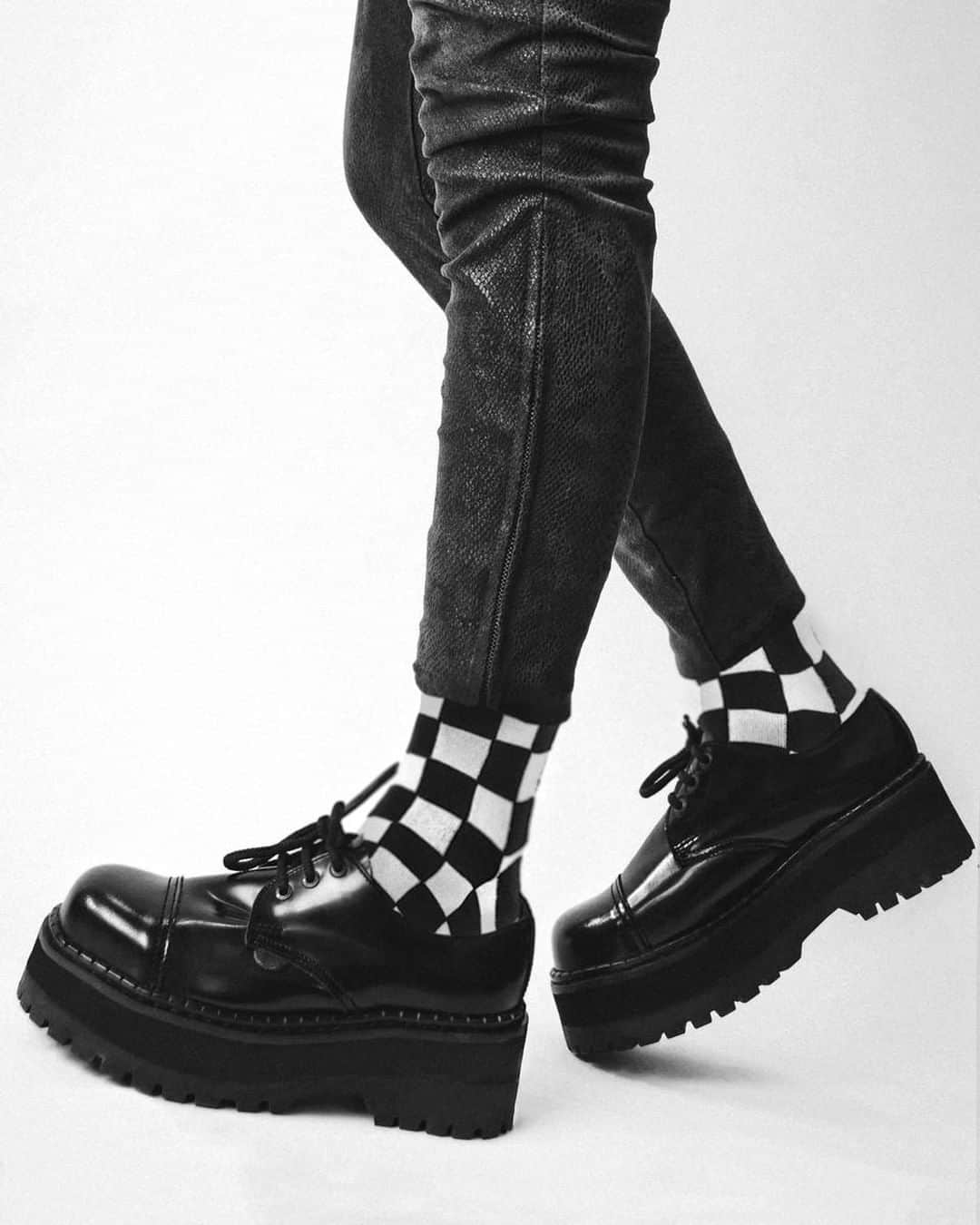 のインスタグラム：「Celebrating 40 years of Two Tone, another British music sub culture inspired. this with its roots in the Reggae and Ska music of the Caribbean. Coventry became the home of many of the Caribbean diaspora and the Two Tone movement and record label was born from the interaction of the working class black and white community in the city.⁠ ⁠ Shoe featured is the Original Tracker Steel Cap on a Triple Sole. Also available on single and double soles. ⁠ ⁠ ⁠ #UndergroundEngland #UndergroundShoes #Undeground #SteelToe #SteelToeBoots #SteelCaps #SteelCapBoots #LaceUpBoots #algender #TwoTone #Coventry #CoventryCityofCulture ⁠」