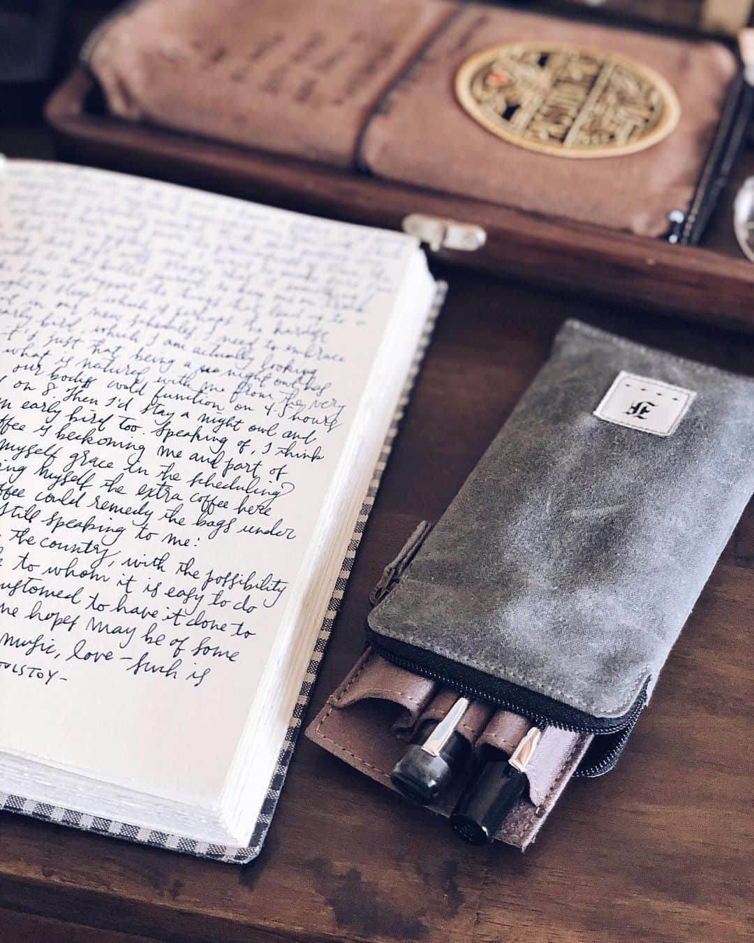 Catharine Mi-Sookさんのインスタグラム写真 - (Catharine Mi-SookInstagram)「I savor and enjoy having a variety of differing creative expressions but I think my favorite will forever simply be a journal page filled with written scribblings. And maybe the occasional ink smear or two. 📖 . . . “In the journal I am at ease.” -Anaïs Nin . . . On my desk: Pocket 6 fountain pen @schon_dsgn. Jackson Journal & Drafter Pouch @pegandawl. Pen Glasses Case & IWO No. 1 Timepiece @franklinchristoph. The Writing Box @galen_leather. . . . #journaling #dailyjournal #morningpages #schondsgn #fountainpens #franklinchristoph #loveforanalogue #pegandawl #leatherjournal #galenleather #writingbox #stationeryaddict #stationerylove #planneraddict #maps #deskdecor #deskspace #abmathome #aquietstyle #inherstudio #stationery #creativespace #penmanship #thedailywriting #journallove」9月4日 1時55分 - catharinemisook