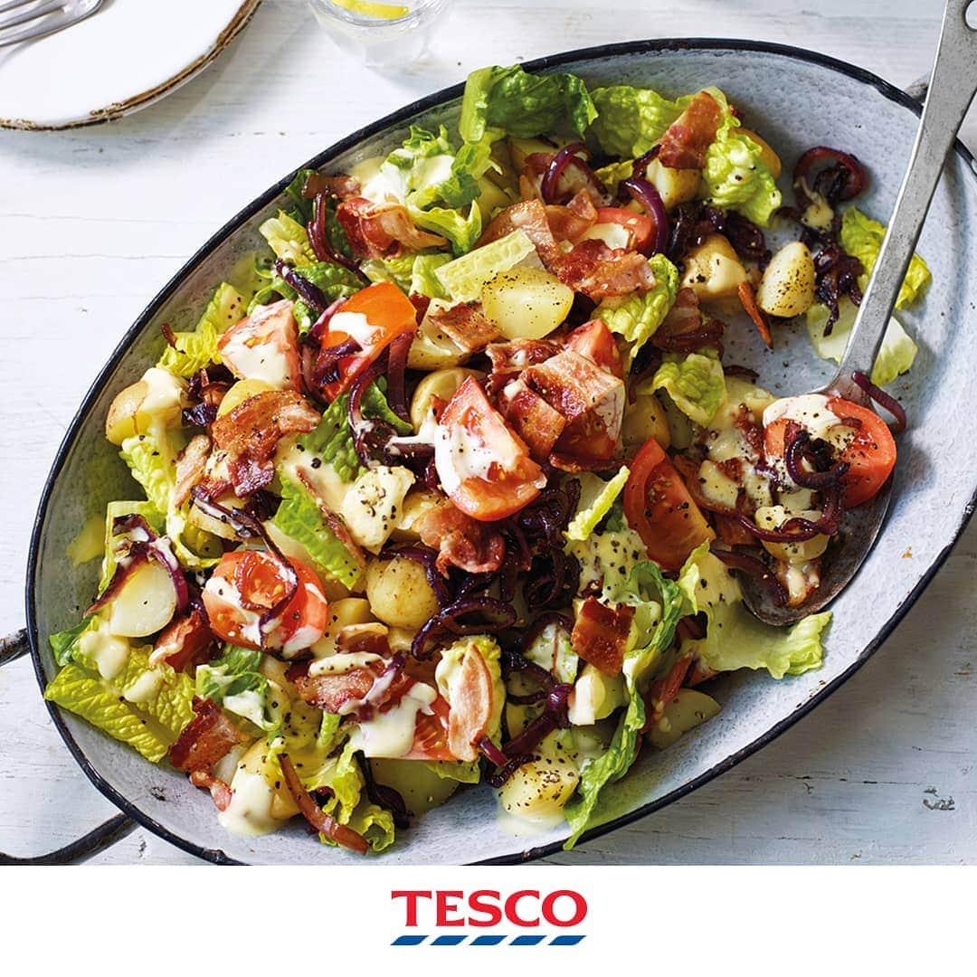 Tesco Food Officialさんのインスタグラム写真 - (Tesco Food OfficialInstagram)「Possibly the most unlikely romances of the summer... but BLT potato salad is a match made in heaven. Either as a light low-prep dinner or flavour-packed side that the whole family will love.  Ingredients 450g miniature potatoes, largest ones halved 1 tbsp olive oil 2 red onions, finely sliced 1 tsp balsamic vinegar 10 rashers streaky bacon 400g salad tomatoes, quartered 1½ heads romaine lettuce, roughly chopped For the dressing 3 tbsp mayonnaise 1 tsp Dijon mustard ½ lemon, juiced 1 tbsp olive oil  Method Put the potatoes in a pan of salted water, bring to the boil and cook for 15 mins until tender. Drain and set aside to cool. While the potatoes are cooking, heat the oil in a nonstick frying pan over a medium heat. Add the onions and cook for 5 mins until starting to soften. Add the vinegar and continue to cook for a further 5 mins until caramelised. Remove from the pan and allow to cool. Put the bacon in the pan and fry until crisp – you may need to do this in batches. Remove from the pan and leave to cool a little, then slice or tear into large pieces. For the dressing, mix all the ingredients together and season to taste. To assemble the salad, combine the potatoes, onions, bacon, tomatoes and lettuce on a large serving dish. Drizzle over the dressing to serve.」8月11日 21時06分 - tescofood