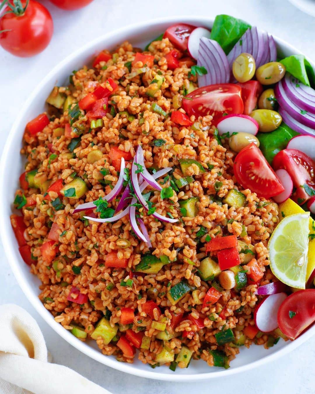 Easy Recipesさんのインスタグラム写真 - (Easy RecipesInstagram)「Let me start by saying I LOVE Turkish food and this Turkish Bulgur Salad is everything! It’s fresh, it’s delicious, it’s filling, it’s vegetarian and it’s one of my favorite Turkish salads! What makes it EXTRA special is the fact that the main ingredients I used are Turkish made. I was honored to receive them from my friends over at @TurkeyDTP . Follow them to learn more about Turkey and all it has to offer! #UniqueTurkishTastes #Turkey #TukishFood #Turkish #Food #Salad #Healthy #Vegan #Vegetarian #HealthyLifestyle  Turkish Bulgur Salad  2 cups Bulgur Wheat, dry (I used Reis Brand) 3 cups boiling water 1/4 cup tomato paste 2 tablespoons roasted red pepper paste 1 tsp. Salt, or more to taste 1/4 cup olive oil (I used Yudum Egemden) 1 cup cucumber, diced 1 red bell pepper, diced 3/4 cup green onion, chopped 1/3 cup fresh parsley, chopped 3/4 tsp. Cumin powder or 7 spice  1 lemon, juice 2 tablespoons Pomegranate Molasses (optional) 1/3 cup purple onion (optional) 2 tablespoons Jalapeño Pepper (optional if you like spicy)  INSTRUCTIONS:  In a bowl, soak the bulgur with the boiling water for 20-30 minutes, mixing occasionally until they are soft and tender. Bulgur should not be chewy.  Meanwhile dice and chop all your ingredients.  In a frying pan bring the olive oil, salt, tomato and pepper paste to simmer and keep cooking on low for about 5-7 minutes, stirring occasionally to form a creamy tomato paste base.  Add in the bulgur and mix to coat well with the tomato paste. Allow the bulgur to cool down for about 10 minutes.  In a bowl, add in all the salad ingredients with the bulgur, lemon juice, pomegranate molasses (optional) and cumin. Taste to see if you prefer to add more salt.  Serve right away or cool in the fridge to serve cold.  https://www.cookinwithmima.com/turkish-bulgur-salad/」8月12日 3時59分 - cookinwithmima
