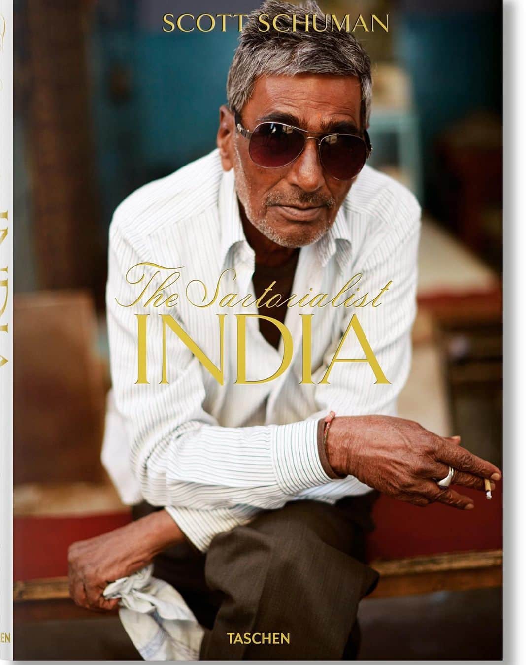 スコット・シューマンのインスタグラム：「I’m beyond excited to finally share the cover of my new book “The Sartorialist: India”! I’m humbled and grateful to have a brilliant partner like @taschen producing the book! I’ve become so accustomed to taking a photo and sharing it immediately that it’s been torture holding back the images in this book until it’s release.  Of the 300 pages in the only, maybe ten images, have been seen before. Big cities, rural villages, fashion weeks, wrestling, music festivals, and simple street life are all a part of this book that I hope, in some small way, captures the exciting diversity and evolution of this wonderful country. You can click the link in my bio to place an advance order on the book that will be released this September!」