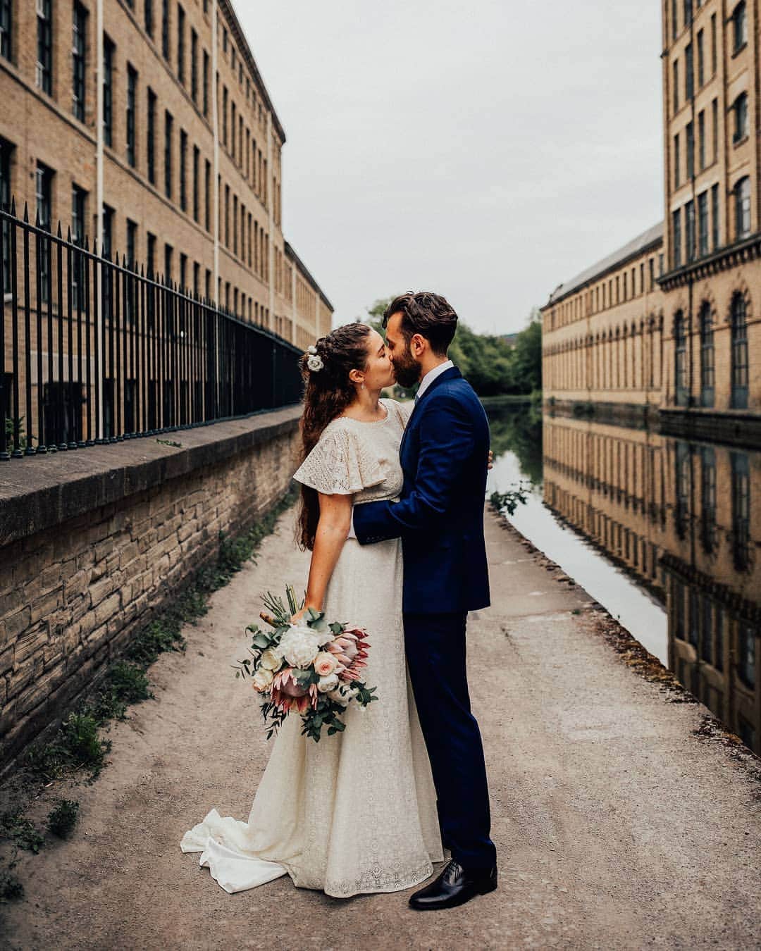 のインスタグラム：「"The Minna was the dress that first caught my attention and as soon as I tried it on I knew it was what I wanted. I had the length that made it feel bridal, gorgeous lace details on the sleeves, and an elegant open back. I had such a fun time at all my appointments. At the first one, I tried on a few dresses before decided on the Minna. The atelier is in such a characterful building and Miina was always so understanding and helpful. The fitting were straightforward, and I was so happy with how the dress turned out." . . . Read Elise's full wedding story and see the gorgeous pictures of their wedding on our blog 😍 Link in bio. . . Photography by @pjphillipsphoto . .」