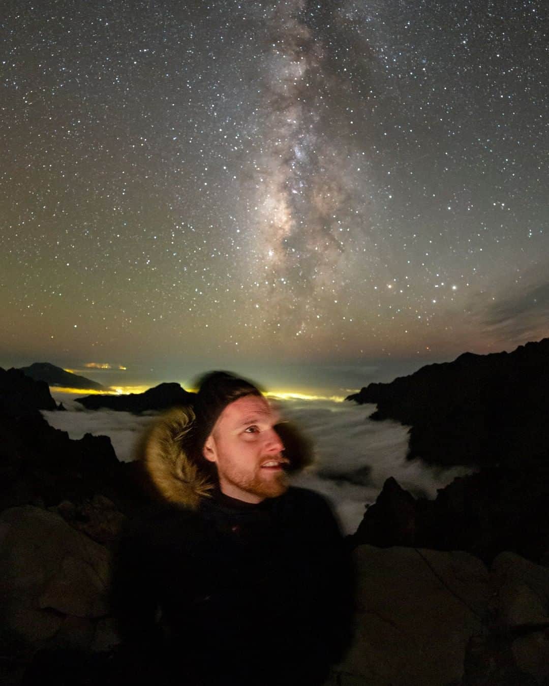 National Geographic Travelさんのインスタグラム写真 - (National Geographic TravelInstagram)「Photo by @BabakTafreshi | ⁣A stargazing destination. ⁣Standing on the edge of La Palma, Canary Islands, home to a massive caldera reaching about 2400 meters high (7900 ft). Photographed here is science communicator Sævar Helgi Bragason who traveled from Iceland to this dark sky-protected island. In this single 20-second exposure his movement after the flash created a ghostly appearance adding a sci-fi feeling to the image. ⁣Follow me @babaktafreshi for more of astronomy and space photography. #saveournightsky #astrophotography #nightphotography #canaryislands」8月13日 16時01分 - natgeotravel