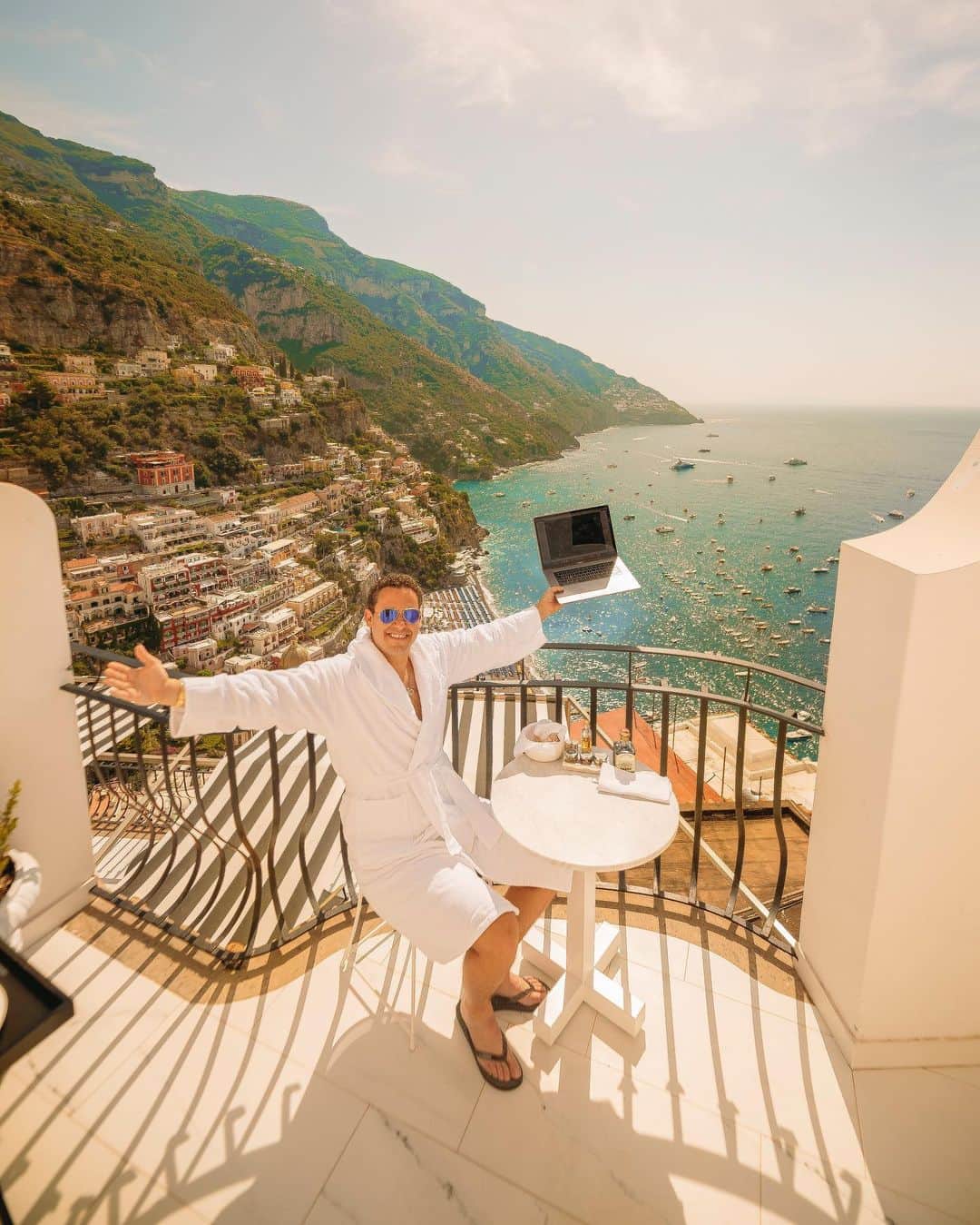 のインスタグラム：「It’s been an incredible few days being back in my favorite town in the world, Positano, Italy at my favorite hotel @villafrancapositano which not only has amazing views and delicious Italian food, but also they literally have the fastest wifi of ANY hotel or villa that I’ve ever been to in Italy so I’m alternating between climbing up hundreds of steps at a time in this magical town while also working away daily with a truly #nodaysoff attitude, finding all the best stocks thanks to @stockstotrade and giving live 2-hour weekly trading and Q&A webinars to my Trading Challenge students (click the link in my bio to apply, but be ready to study your ass off, true education is a marathon, NOT a sprint aka lazy people and I DO NOT GET ALONG)! I’m also very proud to announce my charity @karmagawa is donating $10,000 to @world_animal_protection in honor of #worldelephantday yesterday as sadly these majestic animals are being killed/enslaved at incredible rates like at no other time in history so we must do EVERYTHING possible to save them from extinction which they’re sadly set for in the next decade or so at the current rate if nothing is done. This $10k donation is just the start as we are planning some ambitious projects to truly help to #savetheelephants so stay tuned as big things have small beginnings…I know I’m throwing a lot of information together in this post, but welcome to my life, I’m an insane multitasker and I wouldn’t have it any other way as we only have one life so it’s our duty to live the absolute best and most interesting life possible and to also help the planet before it’s too late in a few years! #ilovemyjob #workfromanywhere #laptoplifestyle #jewswithviews」