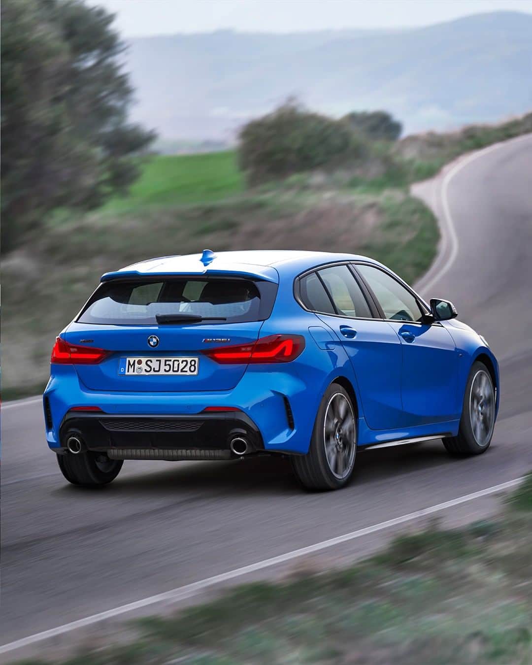 BMWのインスタグラム：「Sure to bring you where you're going.  The all-new BMW 1 Series. #THE1 #BMW #1Series __ BMW M135i xDrive 5-door: Fuel consumption in l/100 km (combined): 7.1 – 6.8. CO2 emissions in g/km (combined): 162 – 155.  Acceleration (0-100 km/h): 4.8 s. Power: 225 kW, 306 hp, 450 Nm. Top speed (limited): 250 km/h. Paint finish shown: Misano Blue metallic.  The values of fuel consumptions, CO2 emissions and energy consumptions shown were determined according to the European Regulation (EC) 715/2007 in the version applicable at the time of type approval. The figures refer to a vehicle with basic configuration in Germany and the range shown considers optional equipment and the different size of wheels and tires available on the selected model. The values of the vehicles are already based on the new WLTP regulation and are translated back into NEDC-equivalent values in order to ensure the comparison between the vehicles. [With respect to these vehicles, for vehicle related taxes or other duties based (at least inter alia) on CO2-emissions the CO2 values may differ to the values stated here.] The CO2 efficiency specifications are determined according to Directive 1999/94/EC and the European Regulation in its current version applicable. The values shown are based on the fuel consumption, CO2 values and energy consumptions according to the NEDC cycle for the classification. Further information on official fuel consumption figures and specific CO2 emission values of new passenger cars is included in the following guideline: 'Leitfaden über den Kraftstoffverbrauch, die CO2-Emissionen und den Stromverbrauch neuer Personenkraftwagen' (Guide to the fuel economy, CO2 emissions and electric power consumption of new passenger cars), which can be obtained free of charge from all dealerships, from Deutsche Automobil Treuhand GmbH (DAT), Hellmuth-Hirth-Str. 1, 73760 Ostfildern-Scharnhausen and at https://www.dat.de/co2/.」