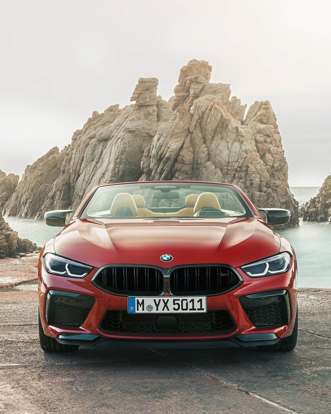 BMWさんのインスタグラム写真 - (BMWInstagram)「High peak of elegance. The first-ever BMW M8 Competition Convertible. #TheM8 #BMW #M8 #BMWM __ BMW M8 Competition Convertible: Fuel consumption in l/100 km (combined): 10.8. CO2 emissions in g/km (combined): 246.  Power: 460 kW, 625 hp, 750 Nm. Top speed (limited): 250 km/h (with optional M Drivers Package: 305 km/h). Paint finish shown: Motegi Red metallic.  The values of fuel consumptions, CO2 emissions and energy consumptions shown were determined according to the European Regulation (EC) 715/2007 in the version applicable at the time of type approval. The figures refer to a vehicle with basic configuration in Germany and the range shown considers optional equipment and the different size of wheels and tires available on the selected model. The values of the vehicles are already based on the new WLTP regulation and are translated back into NEDC-equivalent values in order to ensure the comparison between the vehicles. [With respect to these vehicles, for vehicle related taxes or other duties based (at least inter alia) on CO2-emissions the CO2 values may differ to the values stated here.] The CO2 efficiency specifications are determined according to Directive 1999/94/EC and the European Regulation in its current version applicable. The values shown are based on the fuel consumption, CO2 values and energy consumptions according to the NEDC cycle for the classification. Further information on official fuel consumption figures and specific CO2 emission values of new passenger cars is included in the following guideline: 'Leitfaden über den Kraftstoffverbrauch, die CO2-Emissionen und den Stromverbrauch neuer Personenkraftwagen' (Guide to the fuel economy, CO2 emissions and electric power consumption of new passenger cars), which can be obtained free of charge from all dealerships, from Deutsche Automobil Treuhand GmbH (DAT), Hellmuth-Hirth-Str. 1, 73760 Ostfildern-Scharnhausen and at https://www.dat.de/co2/.」8月14日 17時00分 - bmw