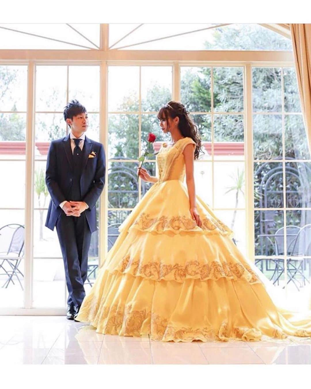 プレ花嫁の結婚式準備アプリ♡ -ウェディングニュースさんのインスタグラム写真 - (プレ花嫁の結婚式準備アプリ♡ -ウェディングニュースInstagram)「憧れのディズニープリンセスに💛美女と野獣がテーマのベル風フォト9選🌹✨ . . ➸➸➸➸➸➸➸💒➸➸➸➸➸➸➸ 本物の料金&見積もり&写真が見れる✨ . ウェディングニュース式場検索 👰 . アプリ： @weddingnews_editor web版： @weddingnews_concierge ➸➸➸➸➸➸➸➸➸➸➸➸➸➸➸➸ . . こちらのお写真は #卒花嫁 @re.na5110 さんからリグラムさせていただきました🌟 #ウェディングニュース のタグにお写真を投稿してくださり、ありがとうございました😊✨ . . . 女の子なら1度は憧れる✨ #ディズニープリンセス 😍💕 . そんなディズニープリンセスの1人 #美女と野獣 のベル風フォトが、どれもうっとりしちゃうほど素敵なんです🌹✨ . カバーは本物の #ベル のような #ウェディングフォト 💛 . 花嫁さんの美しさにうっとり☺️💓バラが1本あるだけでさらにベルらしさを感じる素敵なフォトですよね🌹 . こちらのイエロードレスは実写版美女と野獣でエマ・ワトソンさん演じる知的で美しいベルが着ているドレスを再現した #ディズニー 公式のドレスなんですよ💓 . どのフォトもとても素敵なのでぜひスワイプ👉🏻してみてくださいね✨ . . . ＼📷投稿お待ちしています／ . 花嫁はもちろん、業者さんも大歓迎✨ アナタのお写真をご紹介してもOKという方は、ぜひ #ウェディングニュース にお写真を投稿してください💕 . . ⬇︎関連アカウント⬇︎ . 💒式場検索 【 @weddingnews_concierge 】 👰マイレポ花嫁 【 @weddingnews_brides 】 . . その他、編集部からの連絡専用 @weddingnews_contact や、スタッフ個人の連絡用として @WN_xxxx（xxxは個人名）があります💕 . ………………………………………… ❤️WeddingNewsとは？ . 花嫁のリアルな”声”から生まれた 花嫁支持率No1✨スマホアプリです📱💕 . . 🌸知りたい… #結婚式準備 に役立つ記事を毎日150件配信中♩ . 🌸見たい… インスタの #ウェディング 系投稿TOP100が毎日チェックできる＊IG画像の複数ワード検索も可♩ . 🌸叶えたい… #結婚式 関連の予約サイトが大集合♩ . 🌸伝えたい… 自分の結婚式レポ『マイレポ』が簡単に作れる♩卒花嫁のレポが読める♩ . . @weddingnews_editor のURLからDLしてね✨ . . . #プレ花嫁 #結婚  #花嫁  #ウエディング  #プレ花嫁準備 #2019秋婚 #プリンセス #ディズニーランド #ディズニーウェディング #フェアリーテイルウェディング #前撮り #フォトウェディング #カップル #新郎新婦 #日本中のプレ花嫁さんと繋がりたい #ディズニーランド #beautyandthebeast #カップルフォト」8月14日 20時31分 - weddingnews_editor