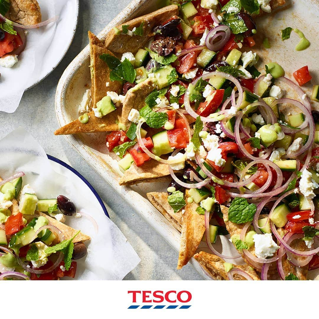 Tesco Food Officialさんのインスタグラム写真 - (Tesco Food OfficialInstagram)「The results are in: Greek salad nachos get top marks on the snack test. A fresh and crunchy collaboration perfect for a summer dinner or little get together.  Ingredients 4 wholemeal pittas, cut into triangles 3 tbsp extra-virgin olive oil 125g pitted Kalamata olives, roughly chopped ½ large cucumber, chopped 4 medium tomatoes, chopped 1 red onion, finely sliced 20g fresh mint, torn 50g reduced-fat feta, crumbled For the feta and avocado sauce 50g reduced-fat feta 1 avocado, halved, stoned and peeled 3 tbsp snipped chives ½ lemon, juiced  Method Preheat the oven to gas 6, 200˚C, fan 180˚C. Spread the pitta triangles out on 2 large baking trays, drizzle with 2 tbsp of the oil and season with salt. Bake for 8-10 mins or until golden and crispy. Meanwhile, put the olives, cucumber, tomato, onion, mint and feta in a bowl. Add the remaining olive oil, season and gently toss to combine. To make the feta and avocado sauce, put all the ingredients and 125ml water in a blender or food processor and blend until smooth. To serve, spread the pitta chips on a large plate. Top with the Greek salad mix and drizzle over the avocado sauce.」8月14日 21時04分 - tescofood