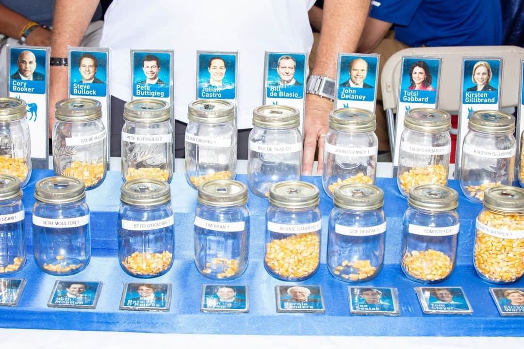 TIME Magazineさんのインスタグラム写真 - (TIME MagazineInstagram)「Corn kernels indicate votes in a poll at the Iowa State Fair, which kicked off Aug. 8 and will wrap up on Aug. 18, in Des Moines. All 20 Democratic presidential candidates have landed, trying to foster connections with voters ahead of the #Iowa caucus in February 2020. @berniesanders enjoyed a corndog and visited the sculpted Butter Cow, while @elizabethwarren, whose appearance drew large and energetic crowds, gamely stood for pictures with fans. @corybooker had some deep-fried vegetables and took a spin on a ferris wheel, while @kamalaharris showed off her skills at the grill. Beyond sampling the food offerings, the candidates talked policy and exchanged ideas with local farmers. See more pictures of the fair’s liveliness and quiet moments, from a beard-judging contest to lounging cattle, at the link bio. Photograph by @mscottbrauer for TIME」8月15日 6時15分 - time