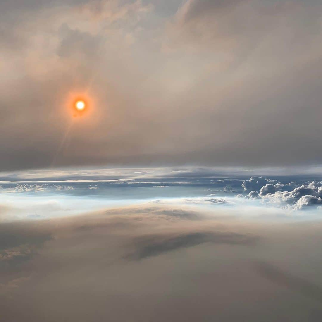 NASAさんのインスタグラム写真 - (NASAInstagram)「Flying through a fire cloud ☁️🔥☁️⁣⁣⁣ ⁣⁣⁣ This photo from roughly 30,000 ft (9 km) shows how smoke particles reflect light in ways that make the Sun appear blazing orange. Our DC-8 flying laboratory passed directly through a large fire cloud — called a pyrocumulonimbus — on August 8 as it was rising from a fire in eastern Washington, giving scientists a look at the phenomena. These clouds form when the intense heat of wildfires lift the smoke above the boundary layer, the lowest part of Earth's atmosphere.⁣⁣⁣ ⁣⁣⁣ The flight was part of a joint NOAA and NASA field campaign called FIREX-AQ. Scientists are studying the composition and chemistry of smoke in the atmosphere to better understand its impact on air quality and climate.⁣⁣⁣ ⁣⁣ NASA Earth Observatory image credit: NASA/Joshua Stevens⁣⁣ Photography credits: U.S. Naval Research Laboratory/David Peterson⁣⁣ ⁣⁣⁣ #nasa #wildfires #science #clouds #fires #ourplanet」8月15日 7時19分 - nasa