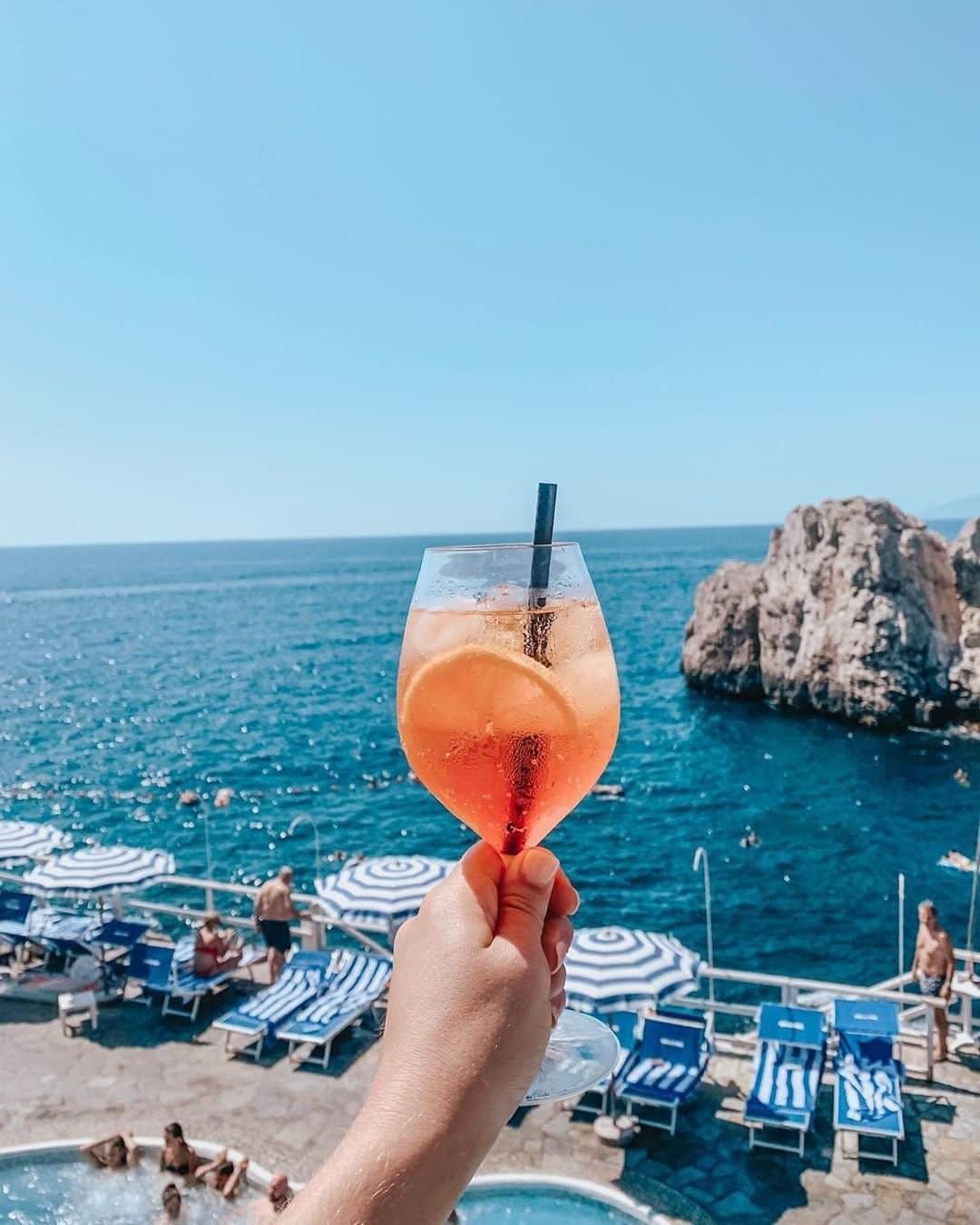 Travel + Leisureさんのインスタグラム写真 - (Travel + LeisureInstagram)「Did you know that Aperol is celebrating its 100th birthday this year? Celebrate with a spritz 🍹 We've rounded up the best bars around the world for an Aperol Spritz — check them out at the link in bio! #tlpicks courtesy of @blonde_atlas」8月15日 7時54分 - travelandleisure