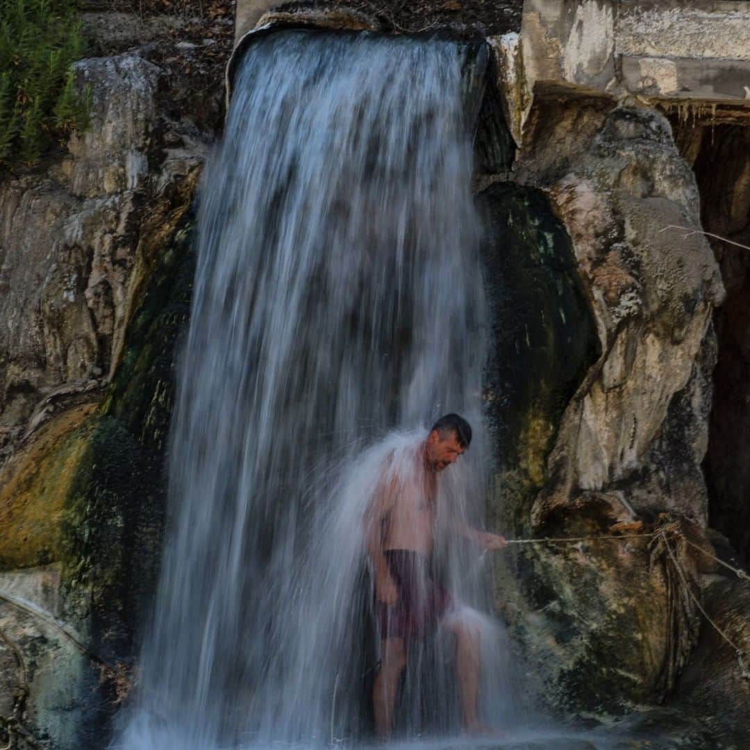 National Geographic Travelさんのインスタグラム写真 - (National Geographic TravelInstagram)「Photo by Muhammed Muheisen @mmuheisen | A man bathes under a waterfall, part of the hot sulphur springs in Thermopylae, central Greece. For more photos and videos from different parts of the world, follow me @mmuheisen and @mmuheisenpublic #muhammedmuheisen #Greece #Thermopylae」8月16日 4時04分 - natgeotravel