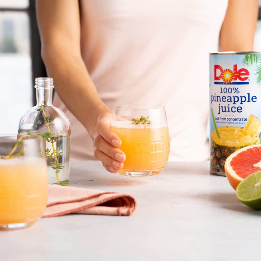 Dole Packaged Foods（ドール）のインスタグラム：「Kickback and relax with a drink in your hand, it’s #NationalRelaxationDay. Celebrate with this sweet, yet tart two-step cocktail made with Dole Pineapple Juice, grapefruit juice, sparkling water, thyme, and vodka.」