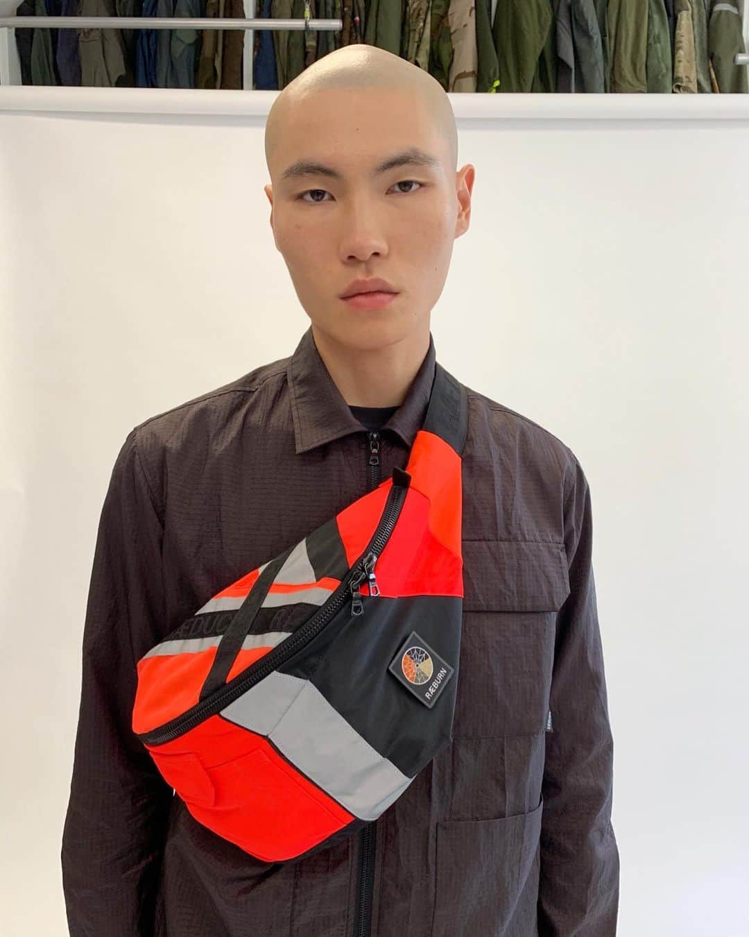 のインスタグラム：「The first drop of our AW19 TEN collection has landed and includes this special bumbag RÆMADE from original German safety jackets featured in the collection. Every bag is entirely unique, individually numbered, limited to 50 and differs in subtle colours and details depending on the placement of the pieces 🧡♻️ -⁠⠀ #RAEBURN #RemadeInEngland」