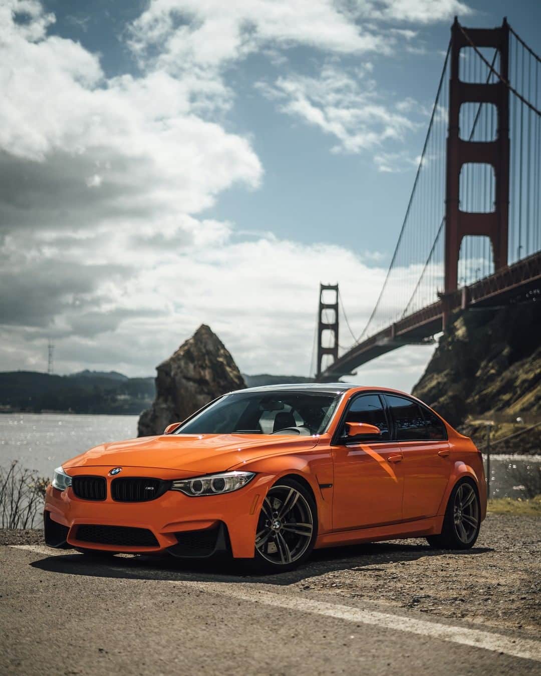 BMWのインスタグラム：「The perfect orange basket: Golden Gate and Individual Fire Orange. The BMW M3 Sedan. #TheM3 #BMW #M3 #BMWM #BMWrepost @Zwalkerrr」