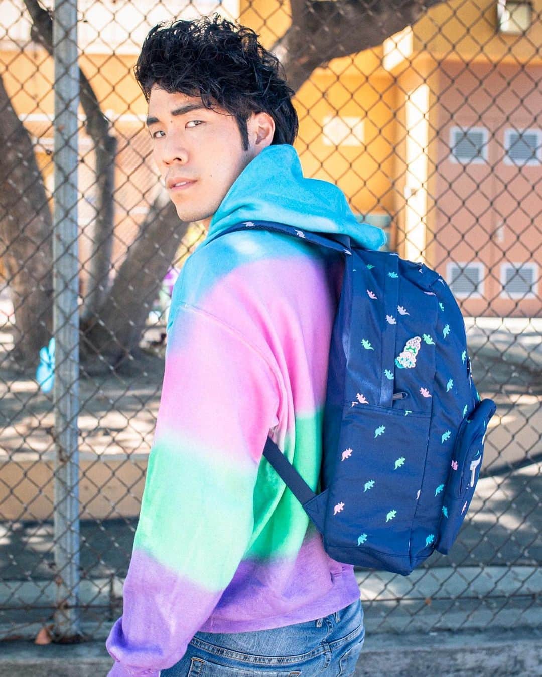 ユージン・リー・ヤンのインスタグラム：「Go back to school in Tryceratops style! 🤘All-new backpack, enamel pins, and dip dye looks are available now at tryguys.com 💙❤️💚💜」