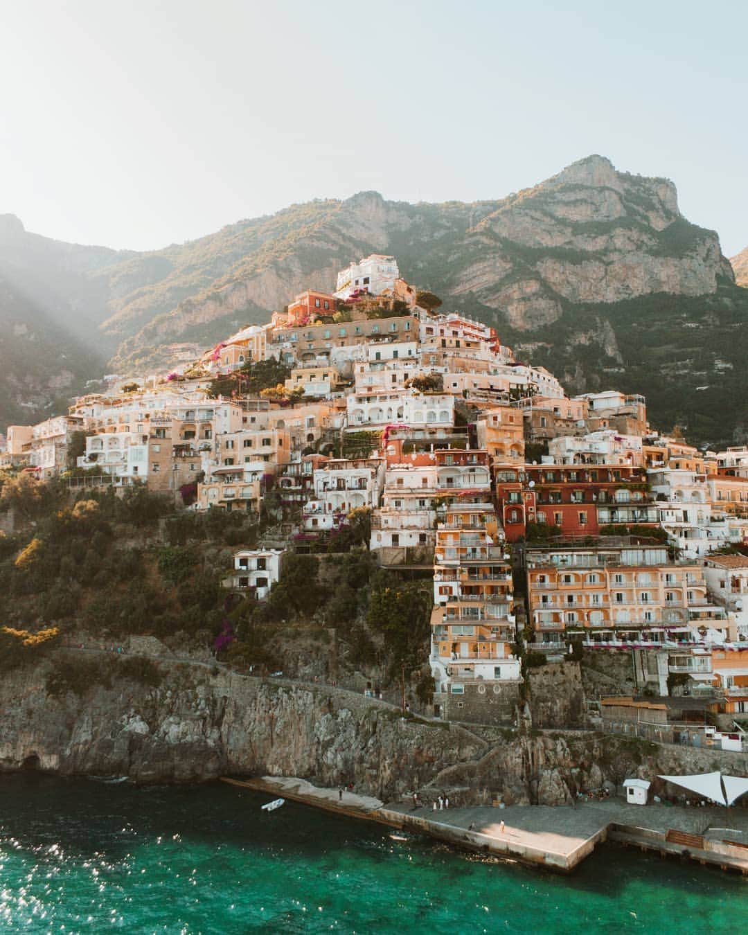 Putri Anindyaさんのインスタグラム写真 - (Putri AnindyaInstagram)「Paradiso // This place is always on my mind everytime I hear someone talk about south Italy in summer. I saw Amalfi Coast for the first time in Talented Mr Ripley. After that I saw Positano when i watched the Sense 8 series. Have you watch those two? 🤔 .  To visit this place is not an easy task if you drive a car. Unfortunately, me and @capra311 came in the peak season so the traffic was quite bad. Anyway, JP managed to drive safely and fly his drone to take this gorgeous sight beautifully. I just want to share this pict that is not mine because it became my favorite picture of Positano that I've ever seen. . . 🚁 By @capra311 ❤️ Edited by me 😉」8月18日 20時00分 - puanindya