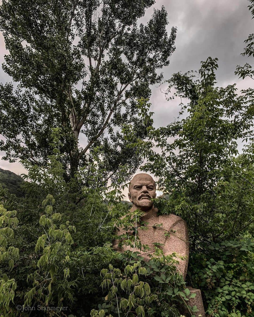ジョン・スタンメイヤーさんのインスタグラム写真 - (ジョン・スタンメイヤーInstagram)「He was just there, standing in Dilijan, Armenia. The only sense of time was all the green. Vladimir had not changed at all ~ Swipe - #dilijan #armenia #vladimirlenin #lenin #statue #leninstatue #communism #trees @natgeo @natgeoimagecollection @bridging.stories」8月19日 10時35分 - johnstanmeyer
