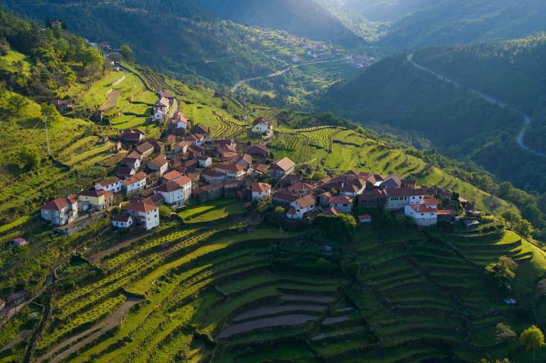 National Geographic Travelさんのインスタグラム写真 - (National Geographic TravelInstagram)「Photo by George Steinmetz @geosteinmetz | There are only 47 people living in the village of Padrão, and most of the work on the terraces appeared to still be done by hand and beast of burden. They call this valley the Tibet of Portugal. It was designated a World Biosphere Reserve by UNESCO a few years ago, which helps to attract ecotourism to sustain the local economy. It was tough find a place to park my car on its one cobbled street, but the potato pancakes were wonderful! To see more of our world from above, follow @geosteinmetz.」8月19日 7時08分 - natgeotravel